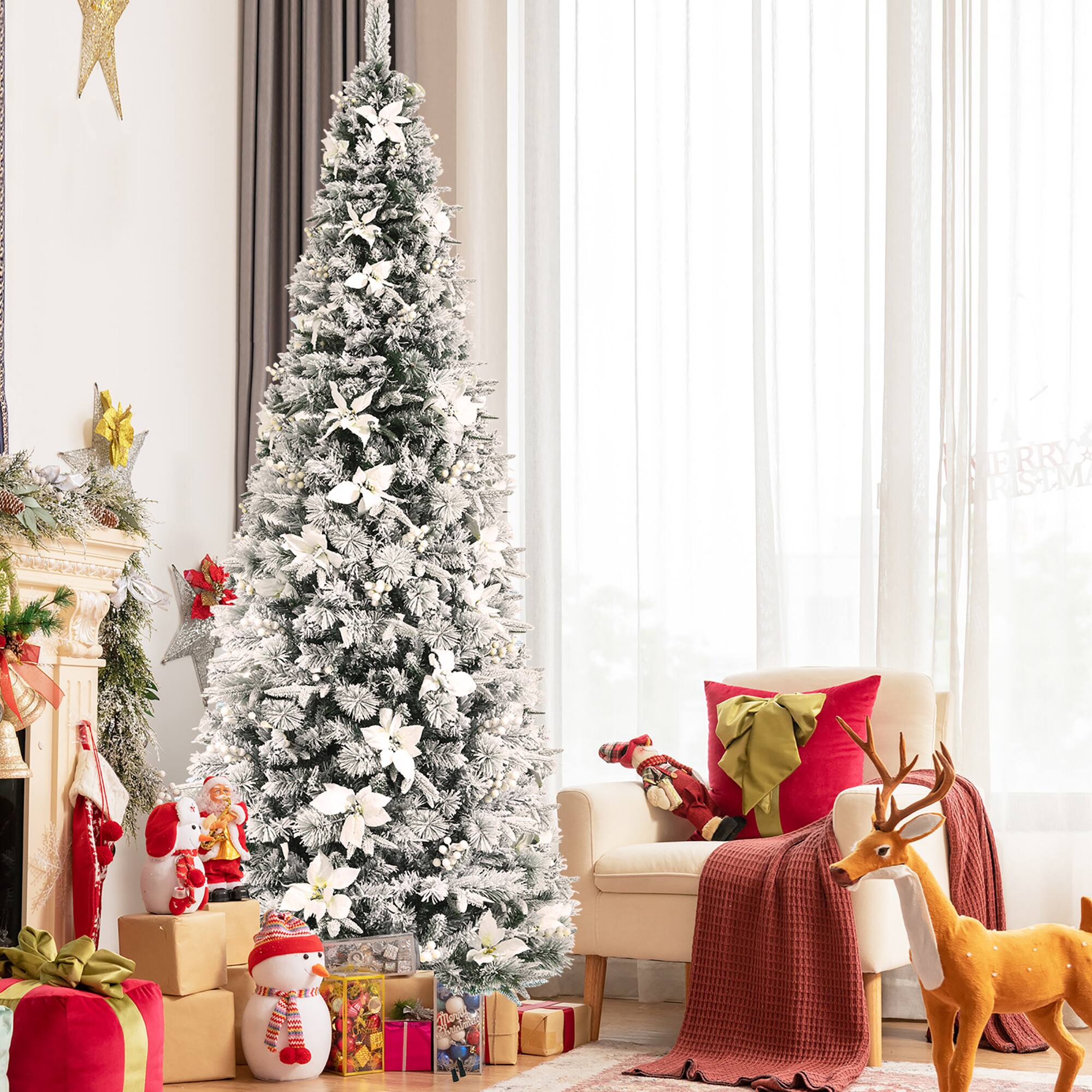 The image features a Christmas tree in a living room, surrounded by various presents and decorations. The tree is adorned with ornaments, and there are two chairs in the room, one near the tree and another further away. A reindeer figurine is also present in the scene, adding to the festive atmosphere. The room appears to be well-decorated for the holiday season, creating a warm and inviting environment for celebrating Christmas.