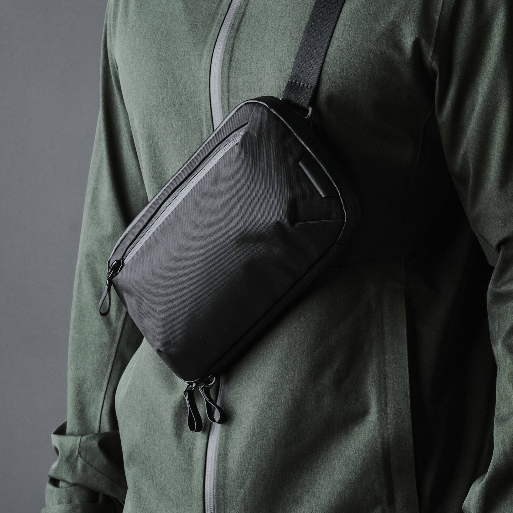 Alt View 2. ALPAKA - Tech Organizer Sling Bag 1.5L with Strap, Accordion Opening, 9 Pockets, Fits Kindle, Weatherproof Fabric, YKK Zippers - Black X-Pac VX42.