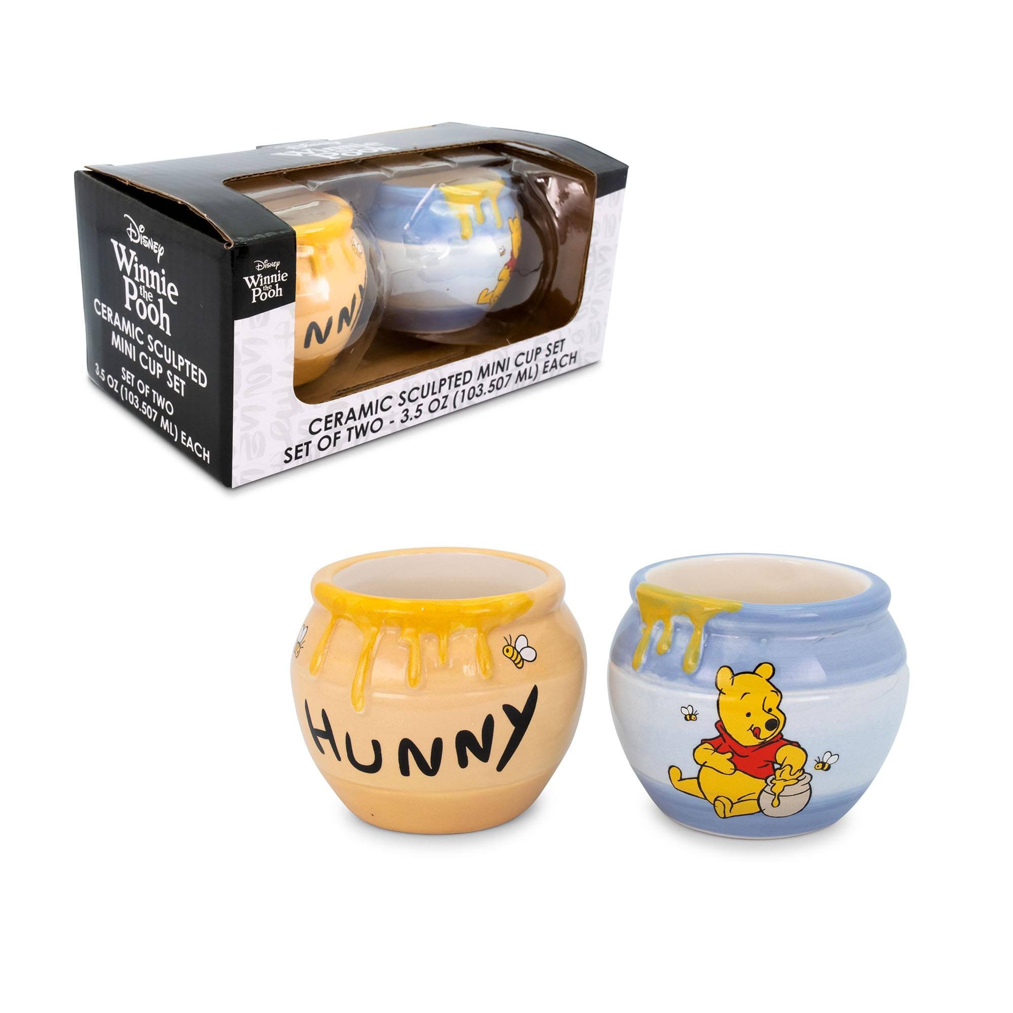 Disney Winnie the Pooh  
CERAMIC SCULPTED MINI CUP SET  
SET OF TWO - 3.5 OZ (103.50 ML) EACH  

CERAMIC SCULPTED MINI CUP SET  
SET OF TWO - 3.5 OZ (103.50 ML) EACH  

HUNNY