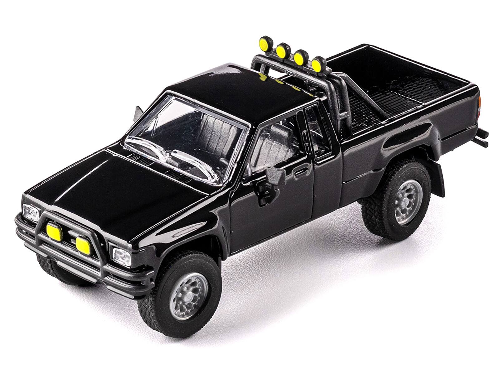 Alt View 3. Majorette - 1985 Toyota Hilux SR5 Pickup Truck Black "Collection" Series 1/64 Diecast Model Car by Majorette.