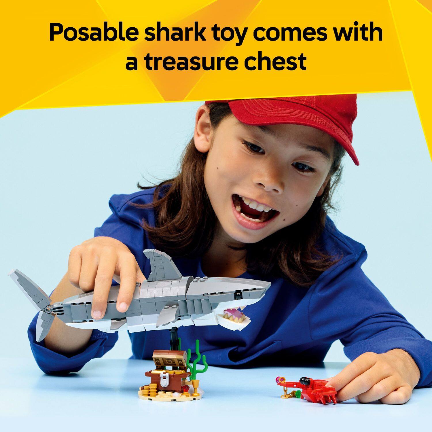 Posable shark toy comes with a treasure chest