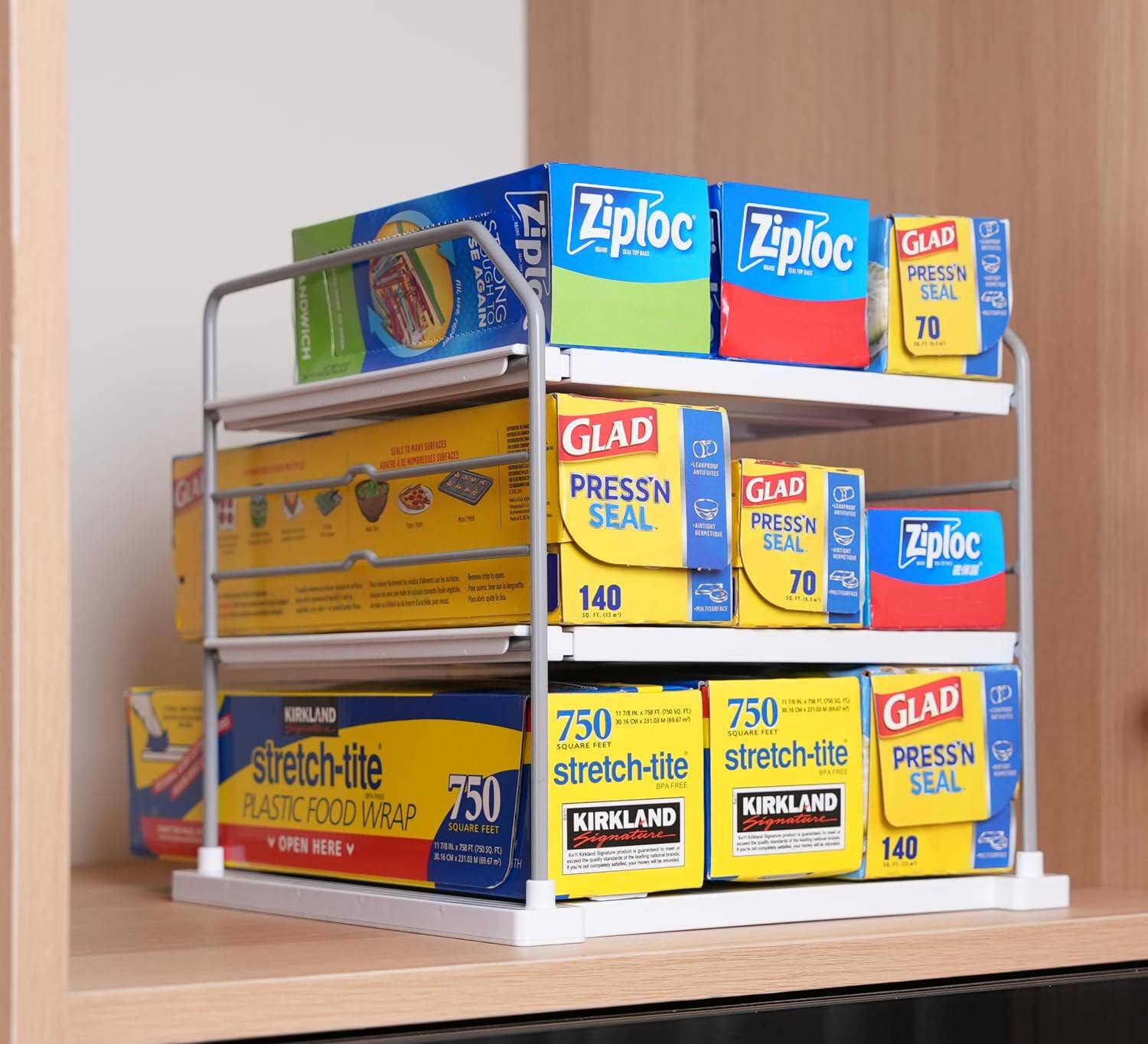 Sure, here is the corrected and grouped text from the image:

---

**Ziploc**  
- 70  
- 140  

**GLAD**  
- PRESS'N SEAL  
  - 70  
  - 140  

**KIRKLAND Signature**  
- stretch-tite  
  - PLASTIC FOOD WRAP  
  - 750 SQUARE FEET  

**KIRKLAND Signature**  
- stretch-tite  
  - PLASTIC FOOD WRAP  
  - 750 SQUARE FEET  

**KIRKLAND Signature**  
- stretch-tite  
  - PLASTIC FOOD WRAP  
  - 750 SQUARE FEET  

**GLAD**  
- PRESS'N SEAL  
  - 140  

**GLAD**  
- PRESS'N SEAL  
  - 70  

**Ziploc**  
- 70  
- 140  

**Ziploc**  
- 70  
- 140  

**Ziploc**  
- 70  
- 140  

**Ziploc**  
- 70  
- 140  

**Ziploc**  
- 