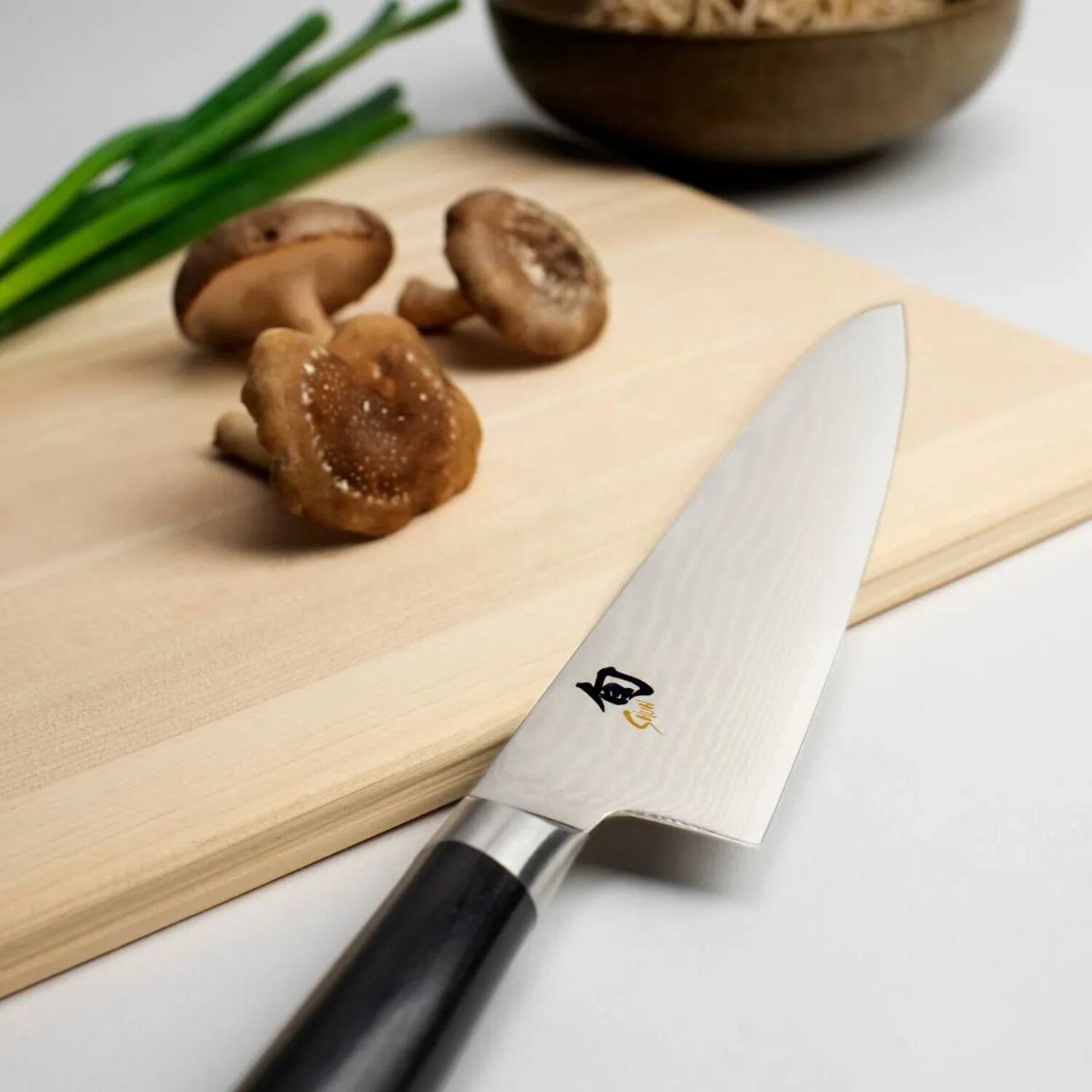 Left. Shun - Classic Asian Cook's Knife, 7 Inch.