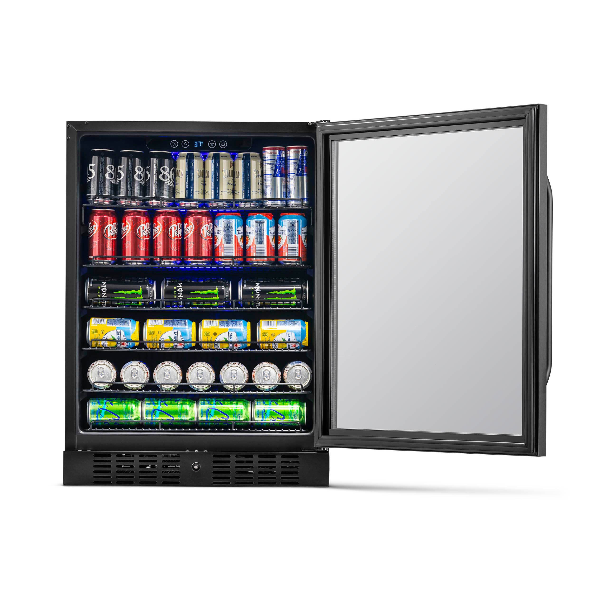 A refrigerator with a variety of drinks, including cans of Mountain Dew and Red Bull.