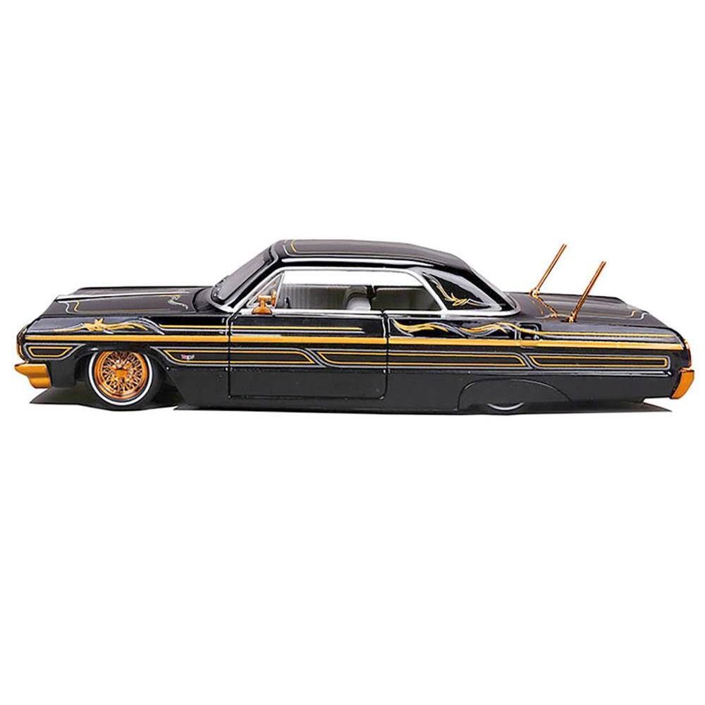 Angle. Maisto - 1964 Chevrolet Impala SS Lowrider Black Metallic w/ Gold Graphics & Gray Interior "Lowriders" Maisto Design 1/26 Diecast - Multi.