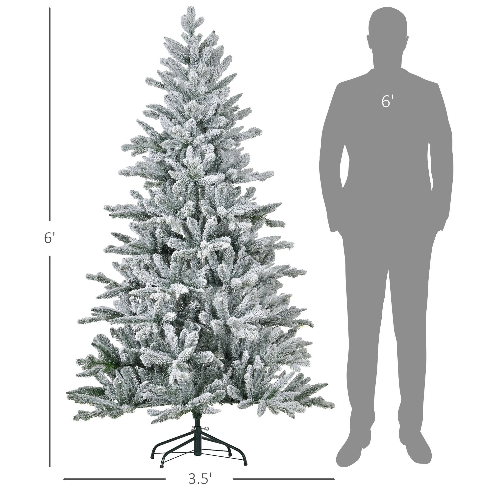 Left. BreeBe - 6ft Snow Flocked Artificial Christmas Tree with 994 Tips - Green.
