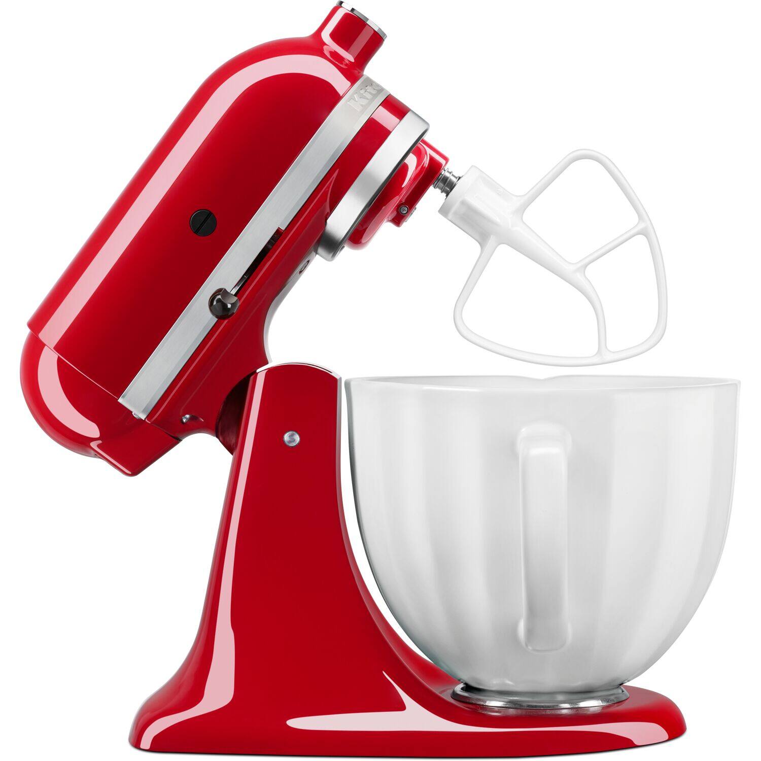 The image features a red mixer with a white bowl, which is filled with flour. The mixer is in the process of mixing the flour, creating a smooth and even consistency. The bowl is placed on a countertop, and the mixer is positioned above it, allowing for easy access and control during the mixing process.