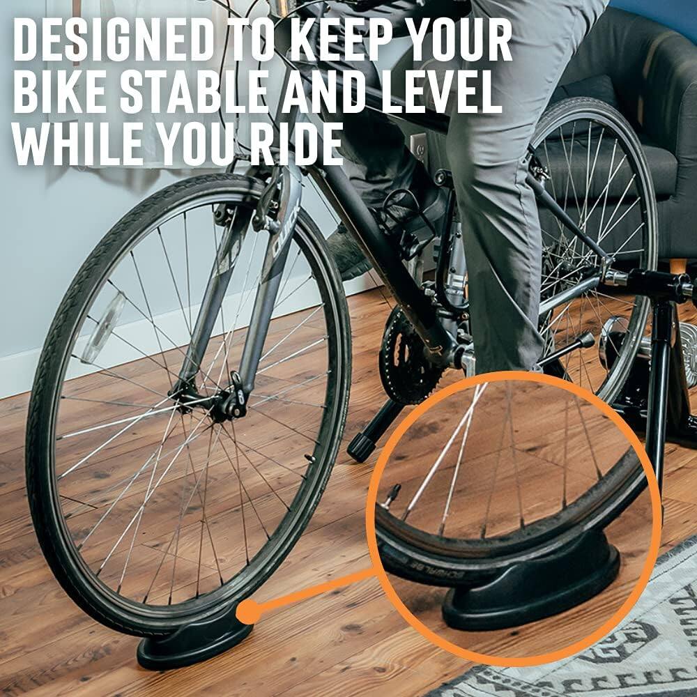 The text on the image is: "DESIGNED TO KEEP YOUR BIKE STABLE AND LEVEL WHILE YOU RIDE."