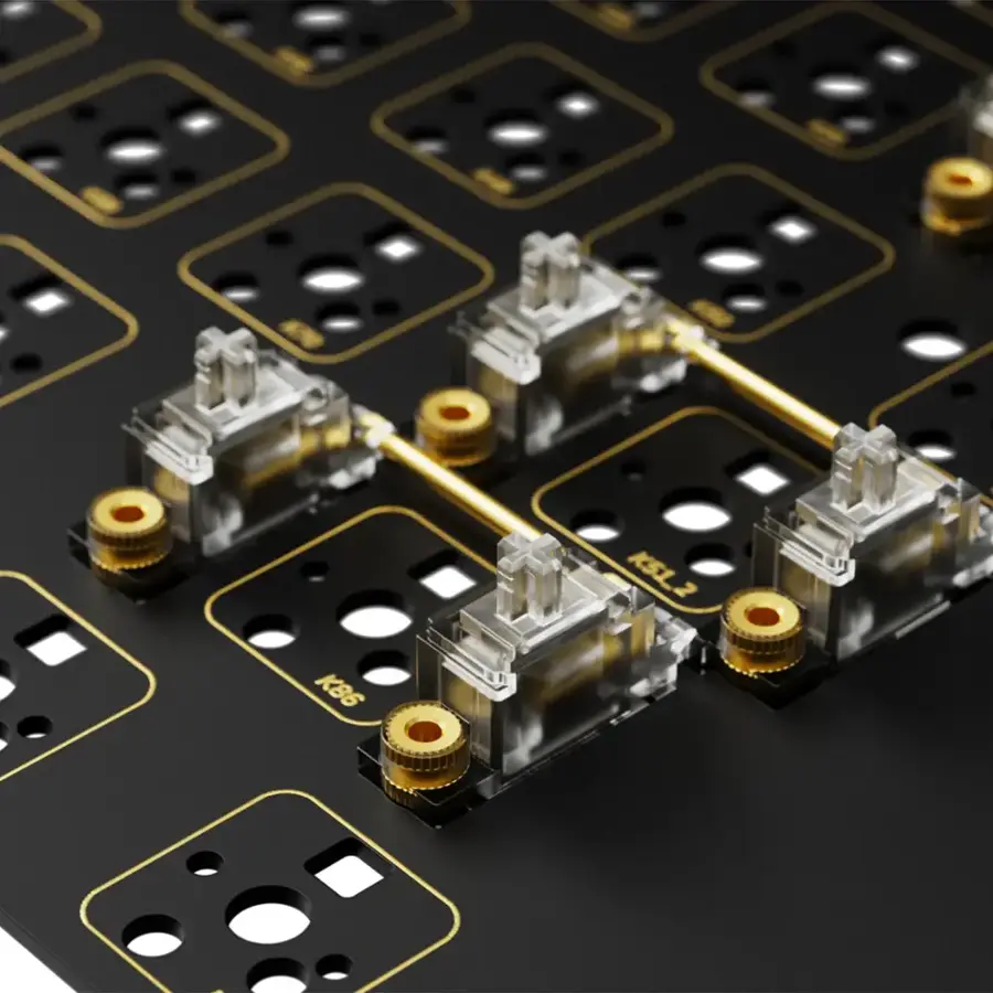 The image features a close-up of a computer keyboard with many small buttons. The largest text on the image reads "KB6 KS12." The keyboard has a black background with gold-colored buttons, making it stand out.