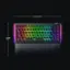 The image features a colorful keyboard with a rainbow design, measuring 321 mm (12.64") in length. The keyboard is designed by the company Razer and is likely intended for gaming purposes. The keyboard has a unique design, with the keys arranged in a way that resembles a rainbow. The keys are also labeled with letters and numbers, making it easy to type on. The keyboard is displayed in a black and white image, which highlights the vibrant colors of the rainbow design.
