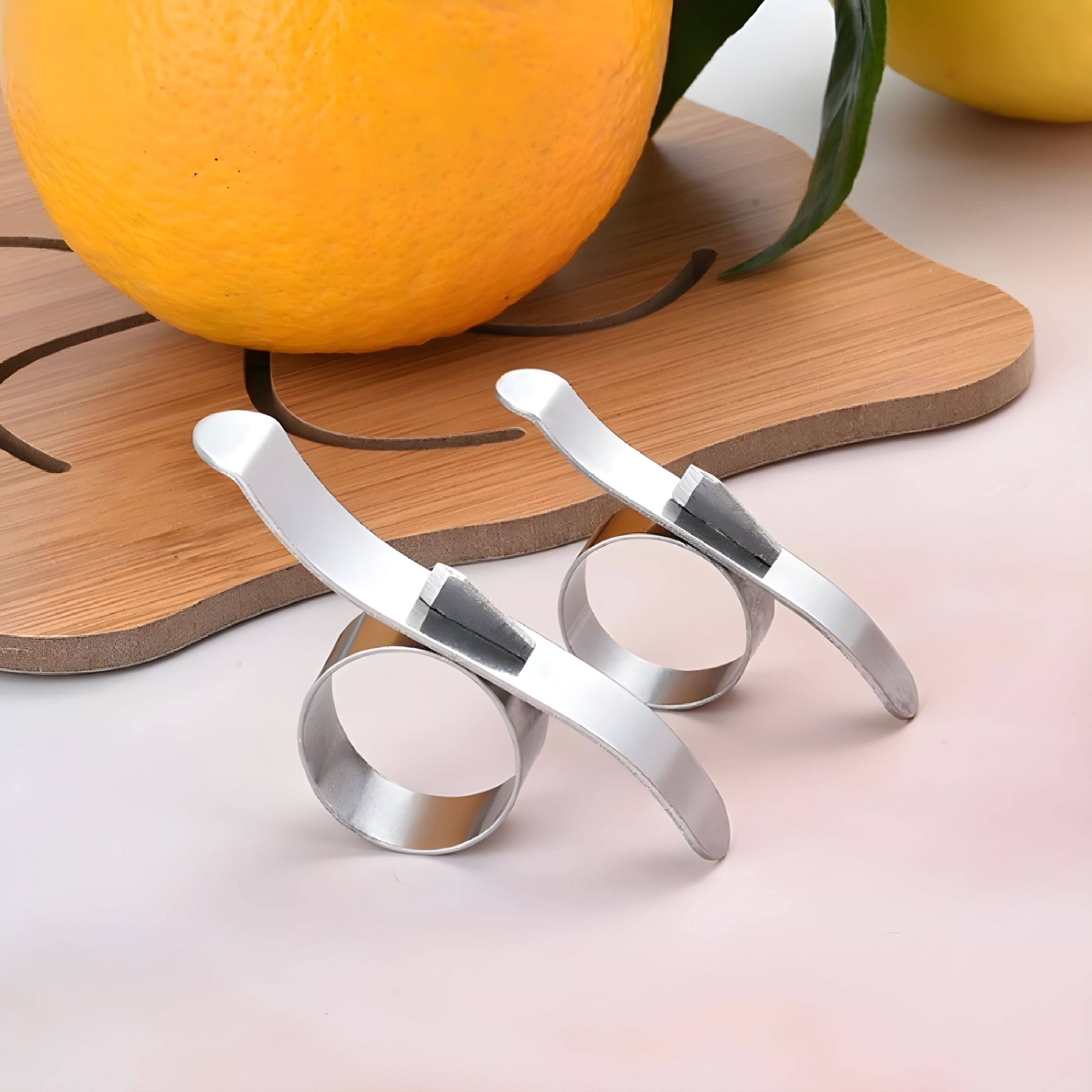 Angle. Kitcheniva - Kitchen Stainless Steel Orange Citrus Peeler Tool 2 Pack - Silver.