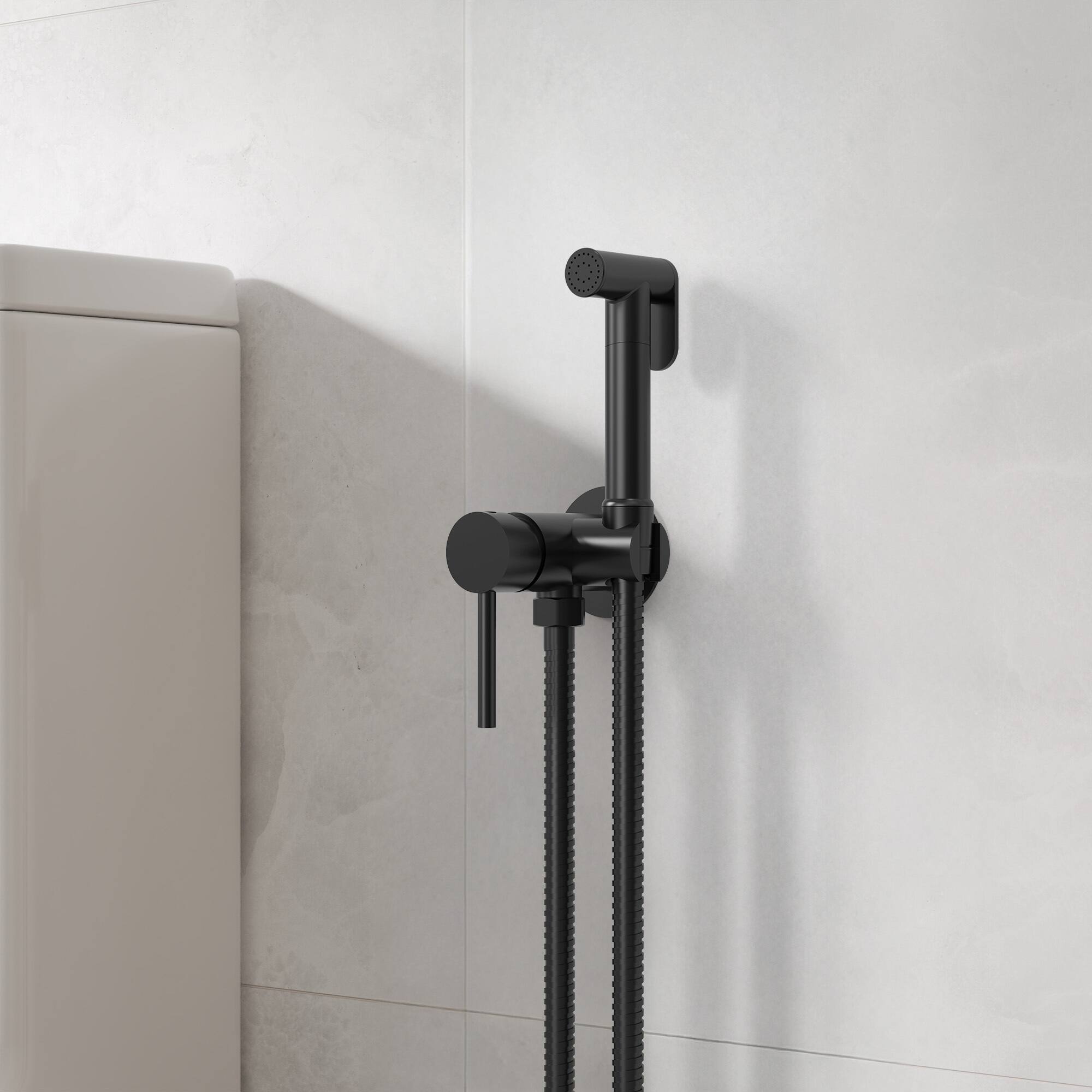 Angle. GRANDJOY - Handheld Bidet Faucet with Hot and Cold Mixing Valve, Wall Mount  - Matte Black.