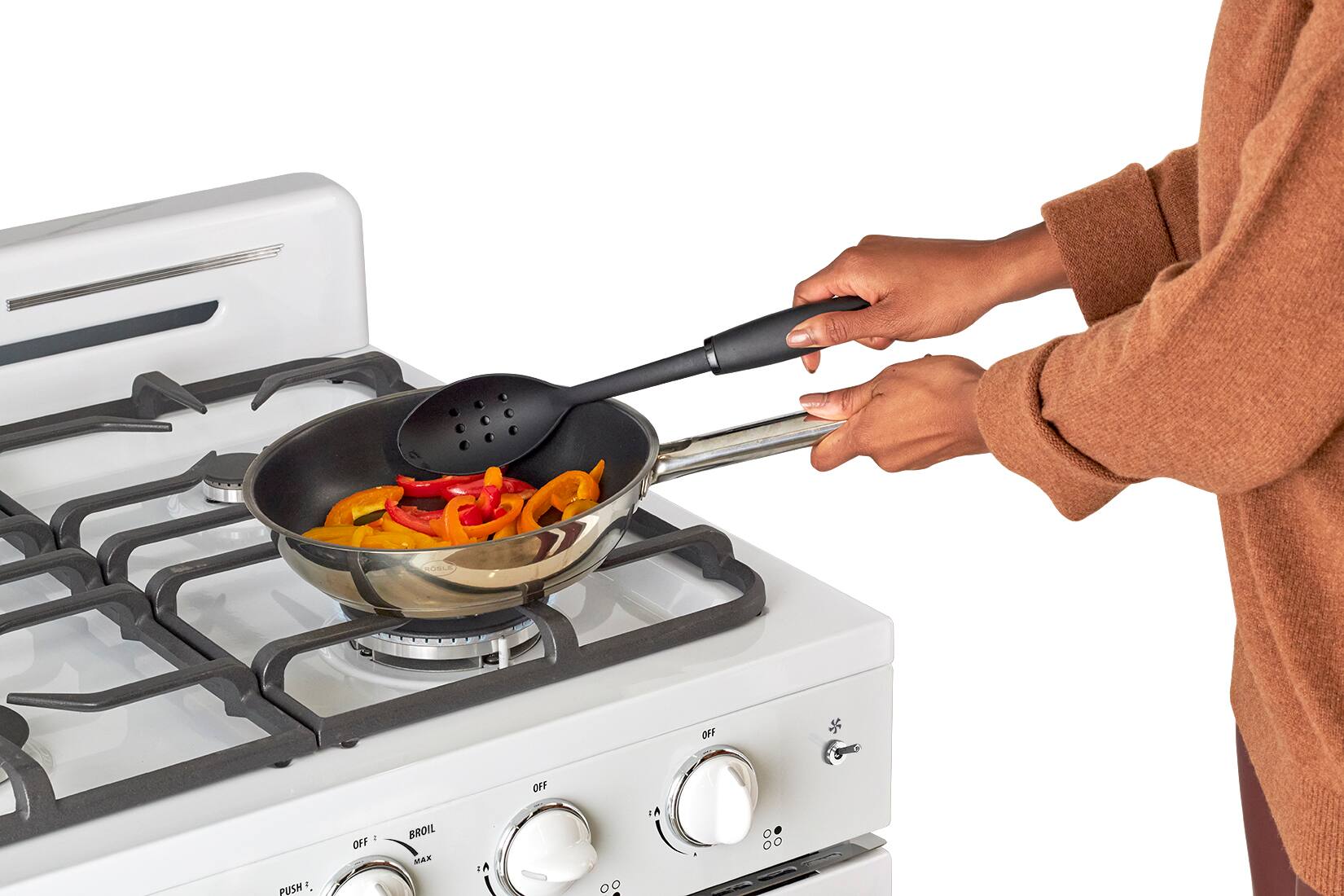 The text on the image reads "OFF PUSH OFF BROIL OFF LA." This text is likely related to the stove's controls and functions. The person in the image is using the stove to cook food, so it is important to ensure that the stove is set to the correct temperature and function for the dish being prepared.