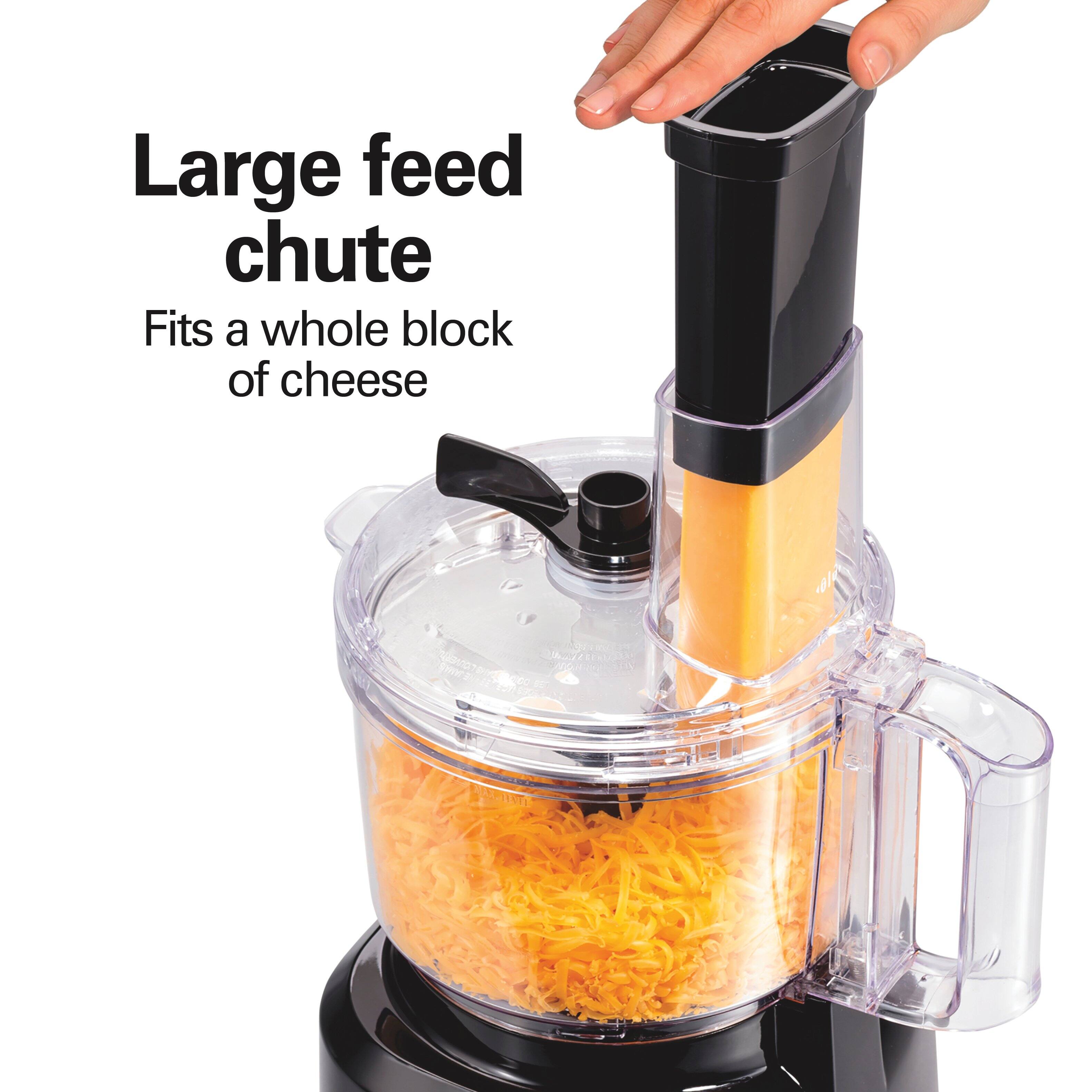 Large feed chute  
Fits a whole block of cheese