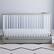 Left. Graco - Teddi 5-in-1 Convertible Crib with Drawer - Pebble Gray/White.