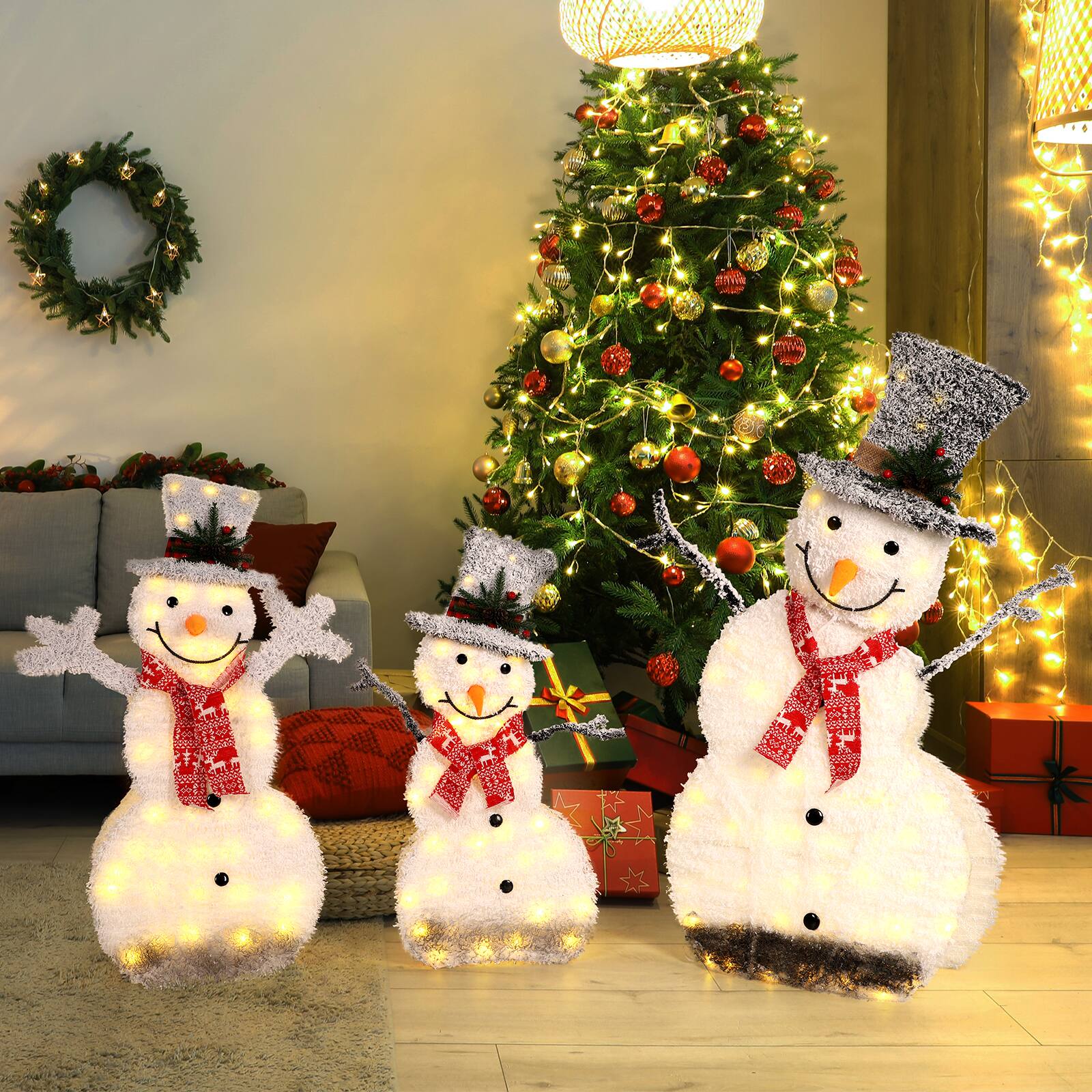 Angle. Oumilen - Pre‑Lit Flocked Snowman Family 3‑Pack – L/M/S Lighted Snowman Set with Top Hat & Red Scarf for Outdoor Lawn Garden.