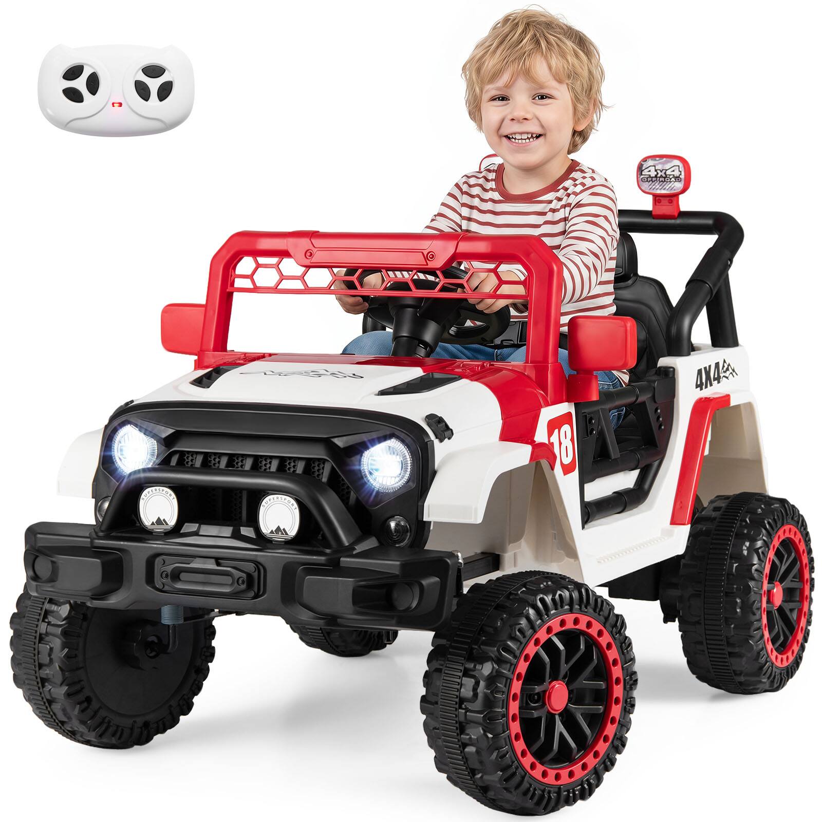 A child is sitting in a toy car that has "4X4" and the number "18" on it.