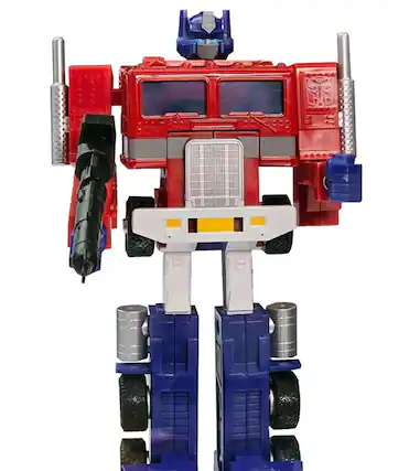 Front. Transformers - Autobot Commander Optimus Prime 40th Anniversary | Transformers G1 Retro Reissues - Grey.