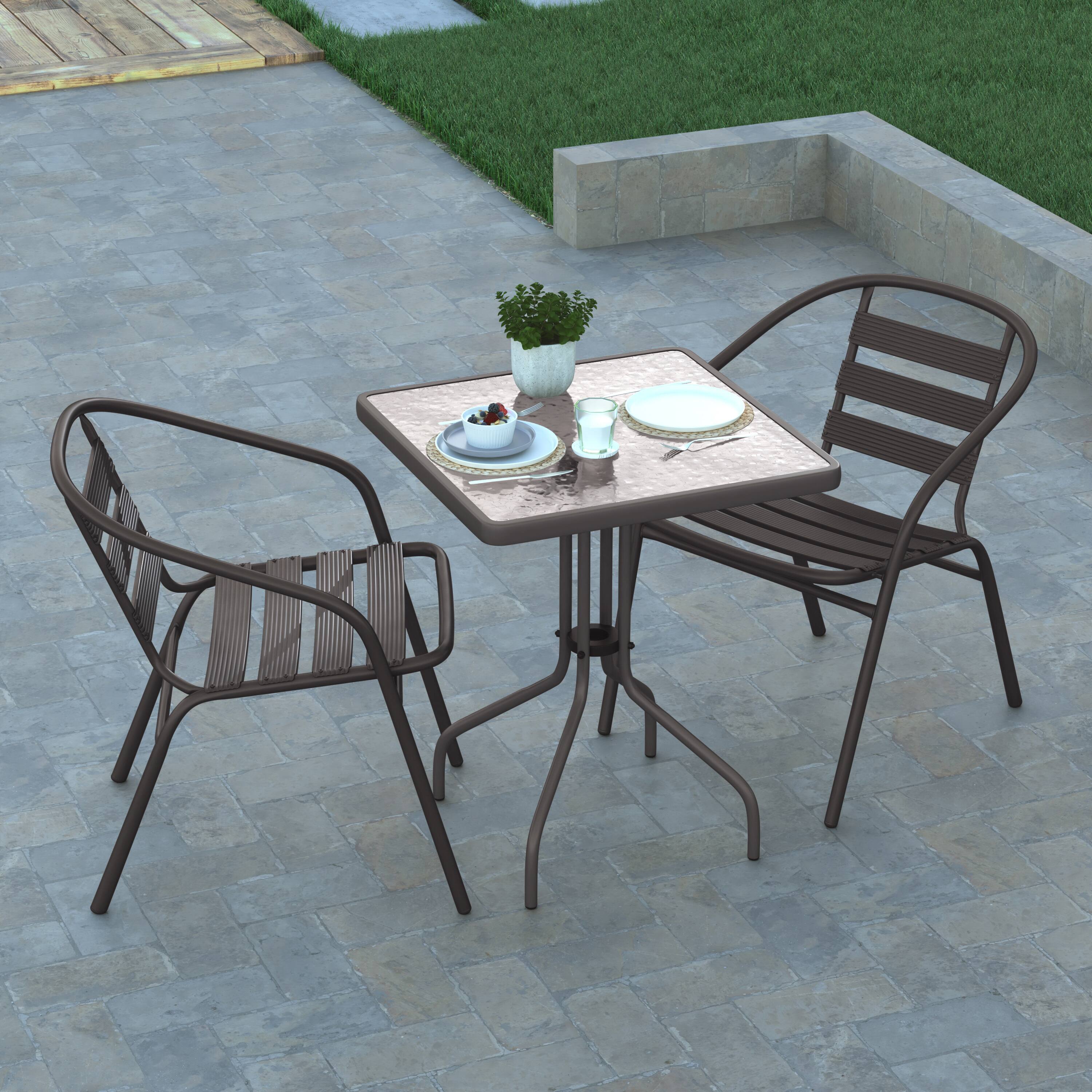 Alt View 4. Emma + Oliver - Rhea 23.5'' Square Glass Top Metal Table with 2 Aluminum Slat Stack Chairs - Bronze.