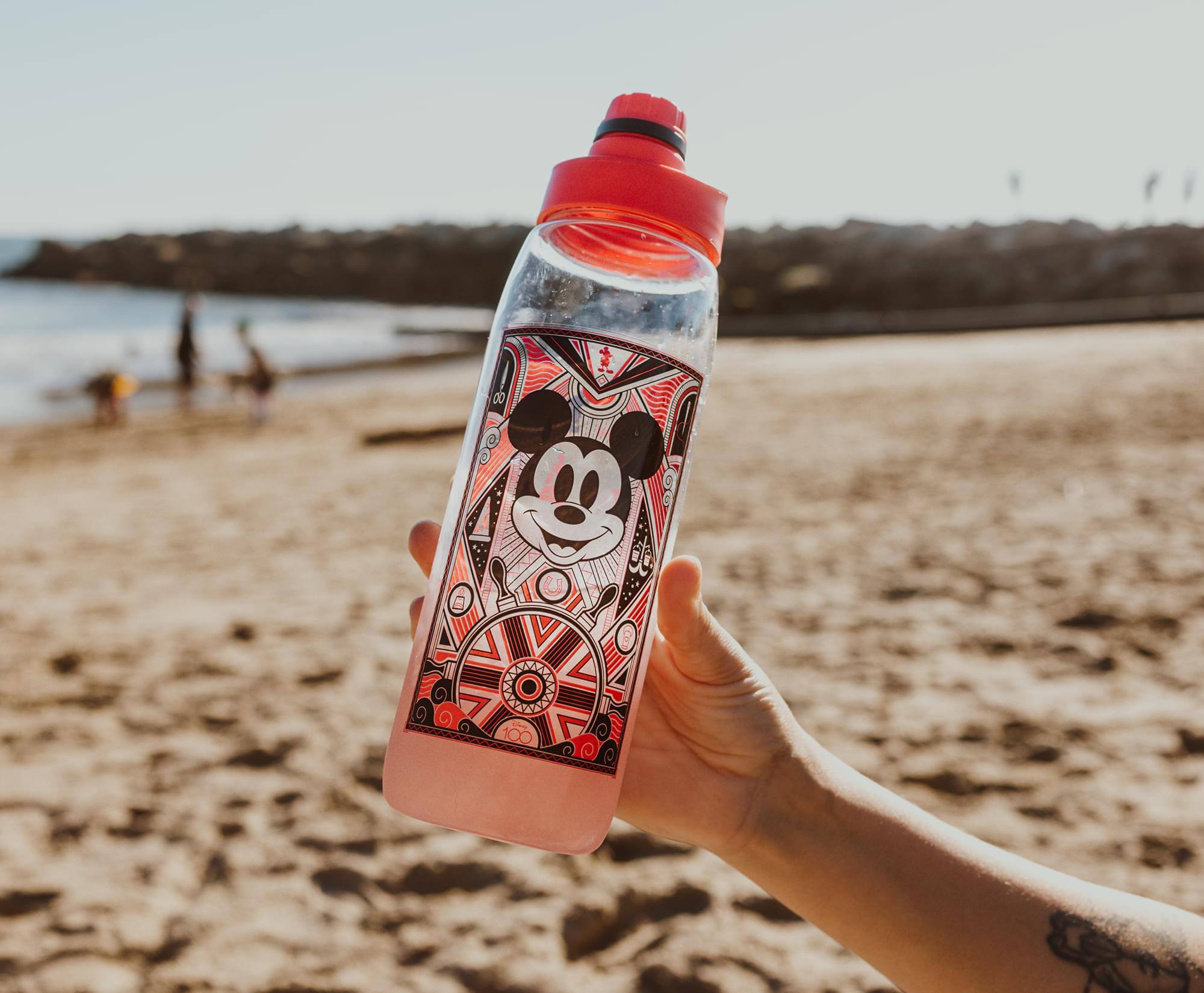 Alt View 2. Silver Buffalo - Disney 100 Captain Mickey Mouse Water Bottle With Timetable | Holds 28 Ounces - Red.