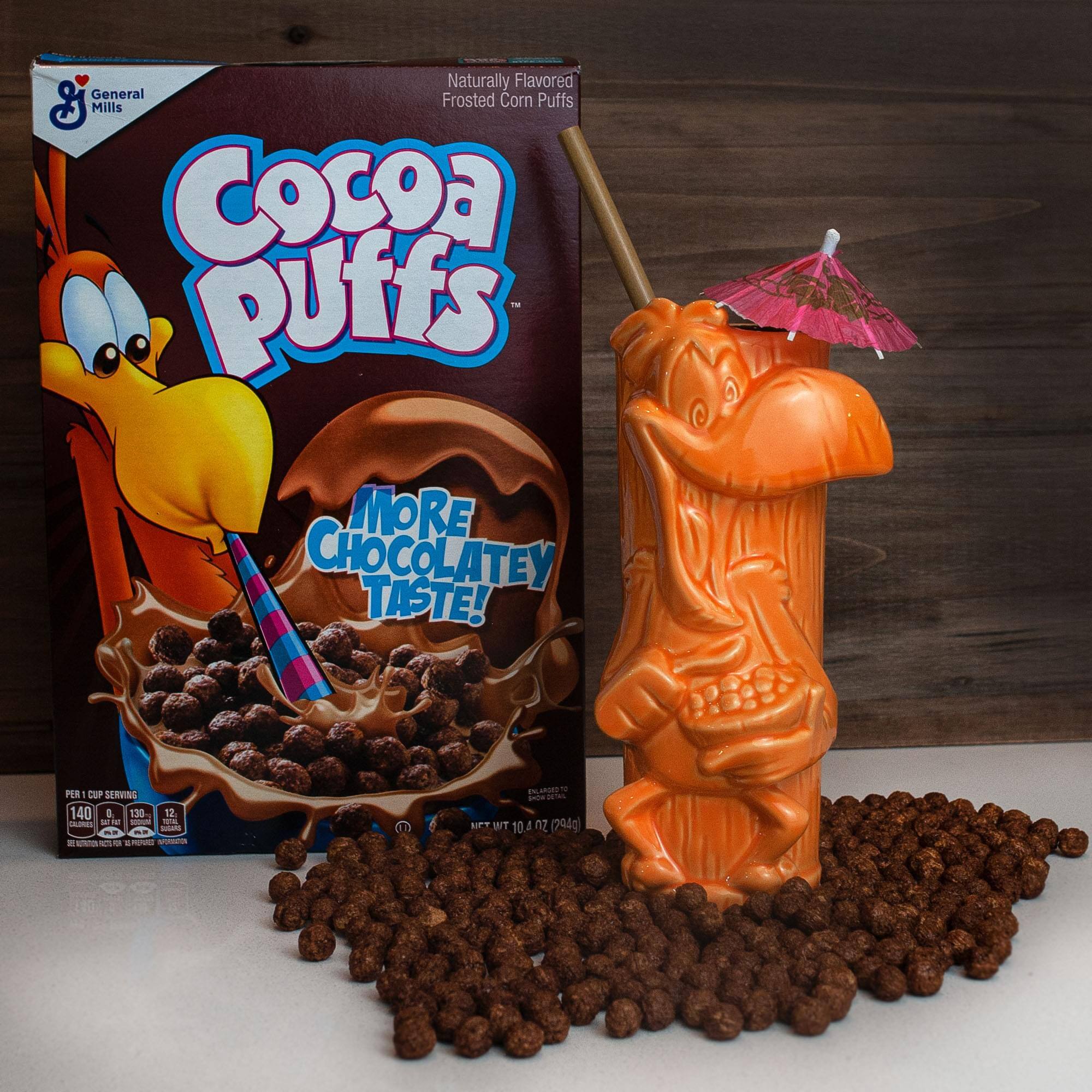 Naturally Flavored General Mills Frosted Corn Puffs Cocoa Puffs - MORE CHOCOLATEY TASTE! PER CUP SERVING 140 D 130 12 - - - - P - -- - a - . moneal ME 1NA9T inde mL P WT 10.4 oz (294g)