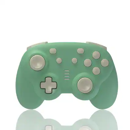 Front. turbX - Mini Mate Wireless Gaming Controller for Switch & PC, LED RGB Charging Stand, 6-Axis Gyro, 3D Joystick - Green.