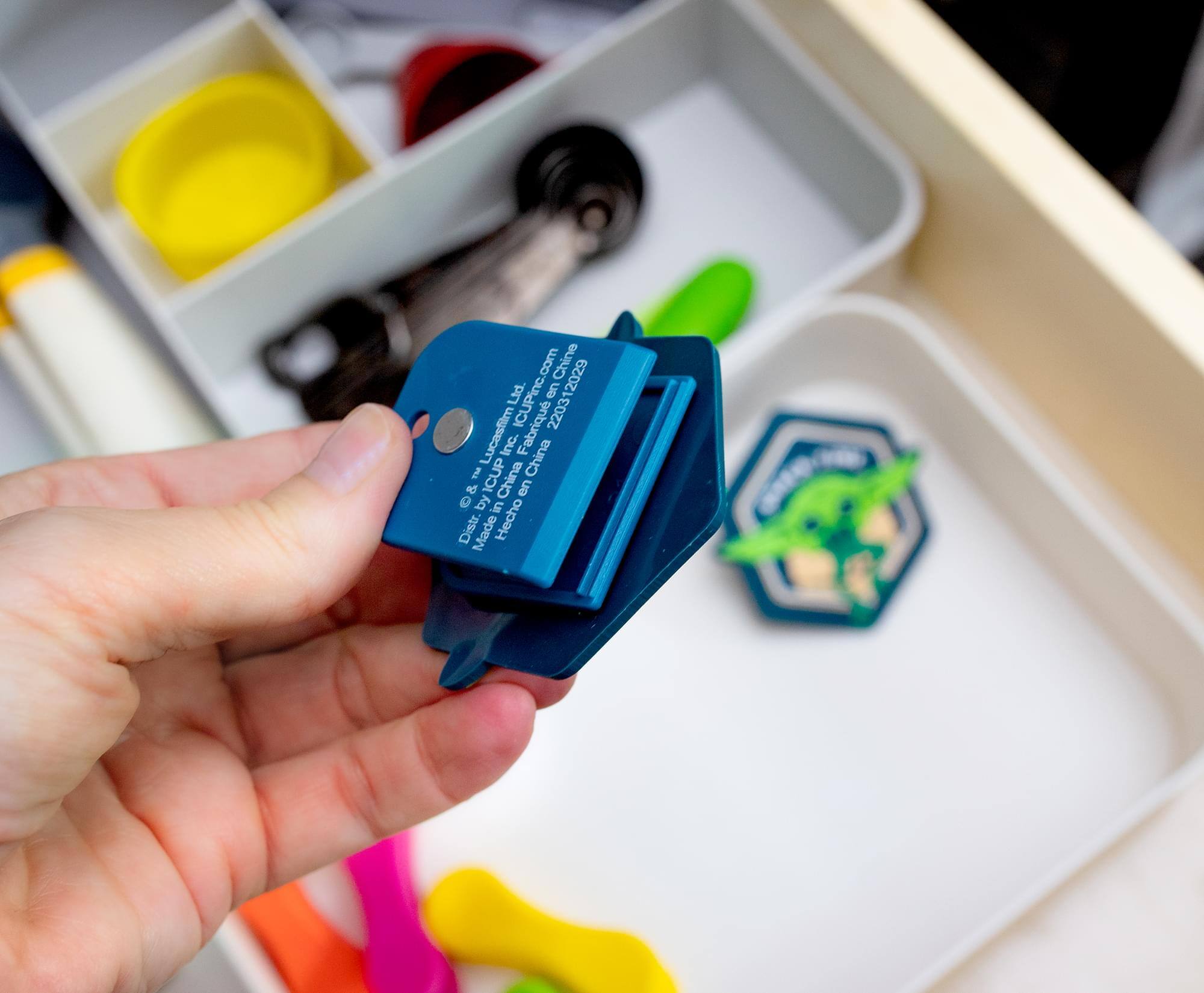 Sure, here is the corrected and grouped text from the image:

---

**Design by:**  
Disney

**Made in:**  
China

**Distributed by:**  
Lucasfilm Ltd.

**Manufactured by:**  
ICUP Inc.

**China**

**TM**

---

**© 2020 Lucasfilm Ltd.**  
**© 2020 ICUP Inc.**

---

**Made in China**