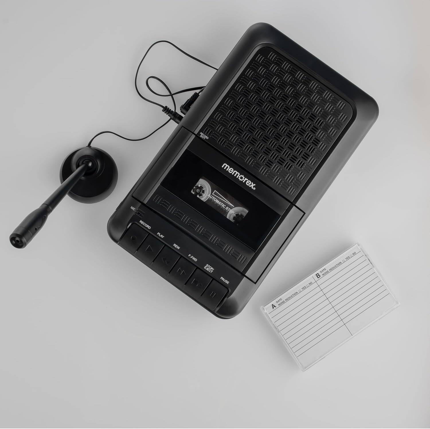 The text on the image is: "Memorex. MC UTOMATIC E RECORD PLAYER 1 FAW L F.PWD I PAUSE e II - N B NH notingor MN N - S AE REDTON."