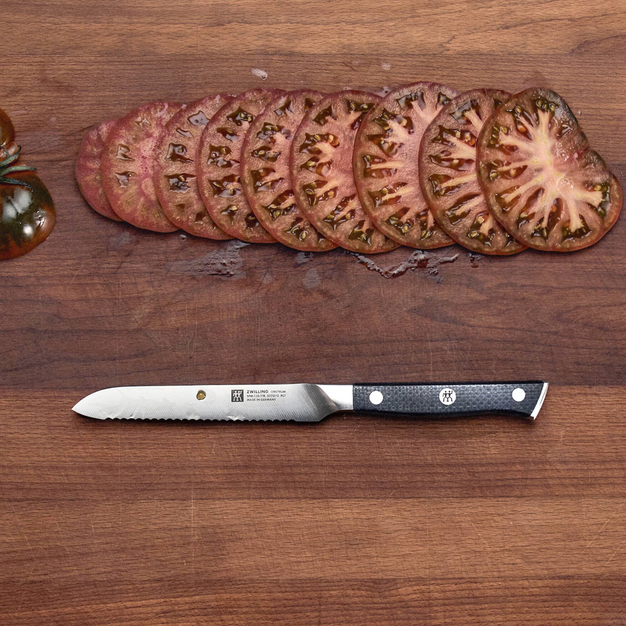 The text on the image reads:

"ZWILLING
J.A. HENCKELS
Made in Germany
100% Stainless Steel
Serrated Edge
8" Serrated Utility Knife"