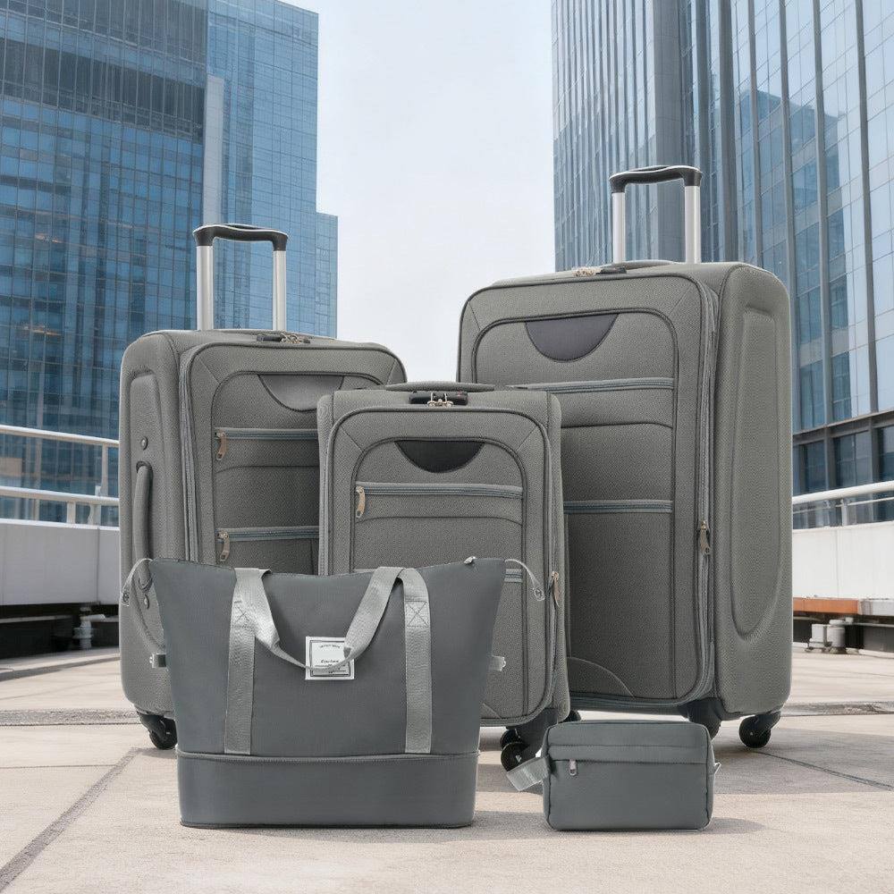 Angle. BreeBe - Softside Expandable 3-Piece Luggage Set with Duffel Bag, Upright Spinner Softshell, Lightweight Travel Suitcases - Grey.