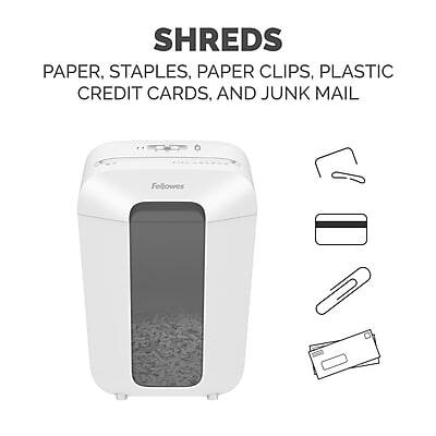 SHREDS  
PAPER, STAPLES, PAPER CLIPS, PLASTIC CREDIT CARDS, AND JUNK MAIL