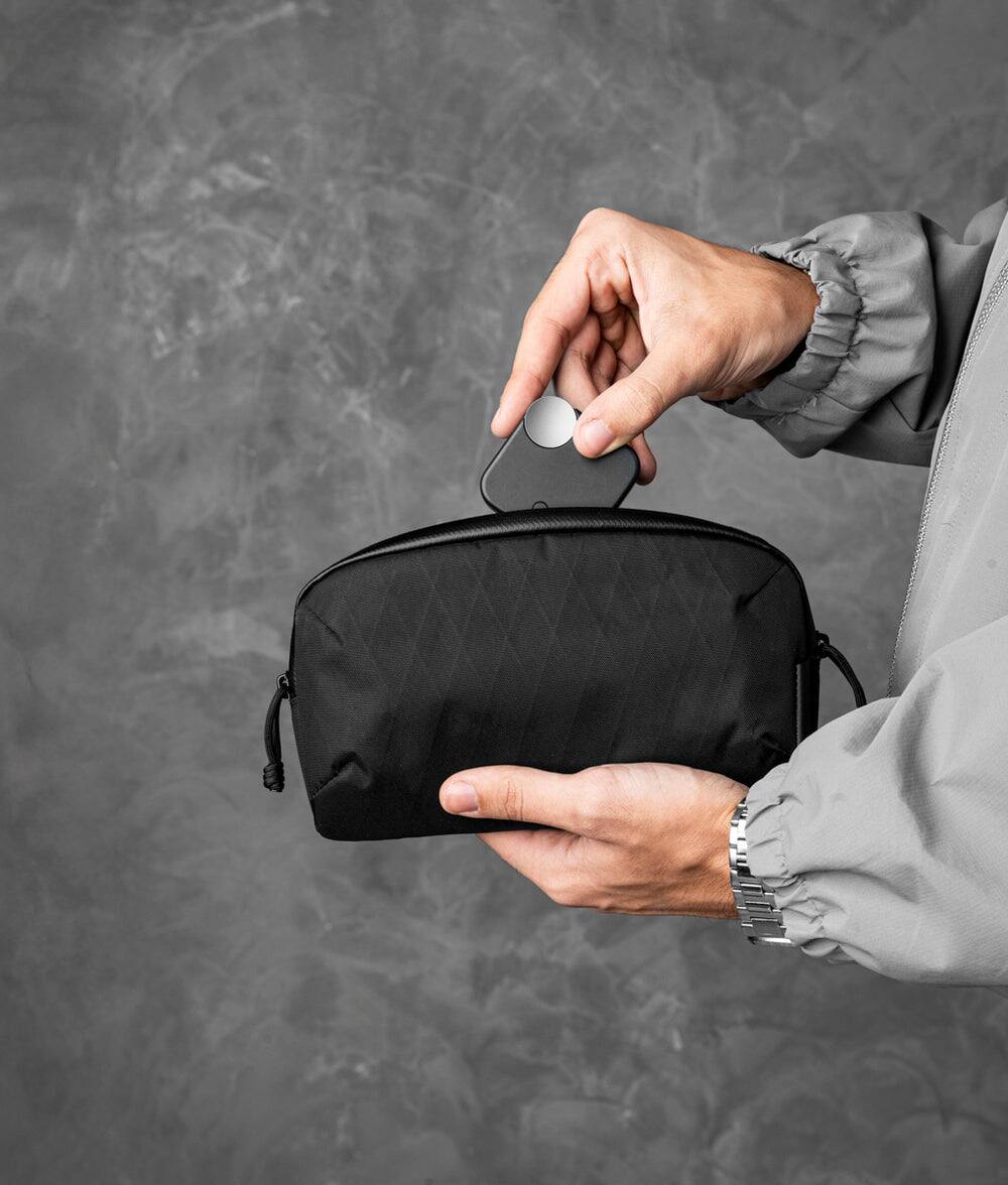 Alt View 1. ALPAKA - Flight Pouch Pro Passport Holder for Travel,Small Crossbody Bag for Men, phone holder bag,RFID sleeves for credit cards - Black X-Pac X42.