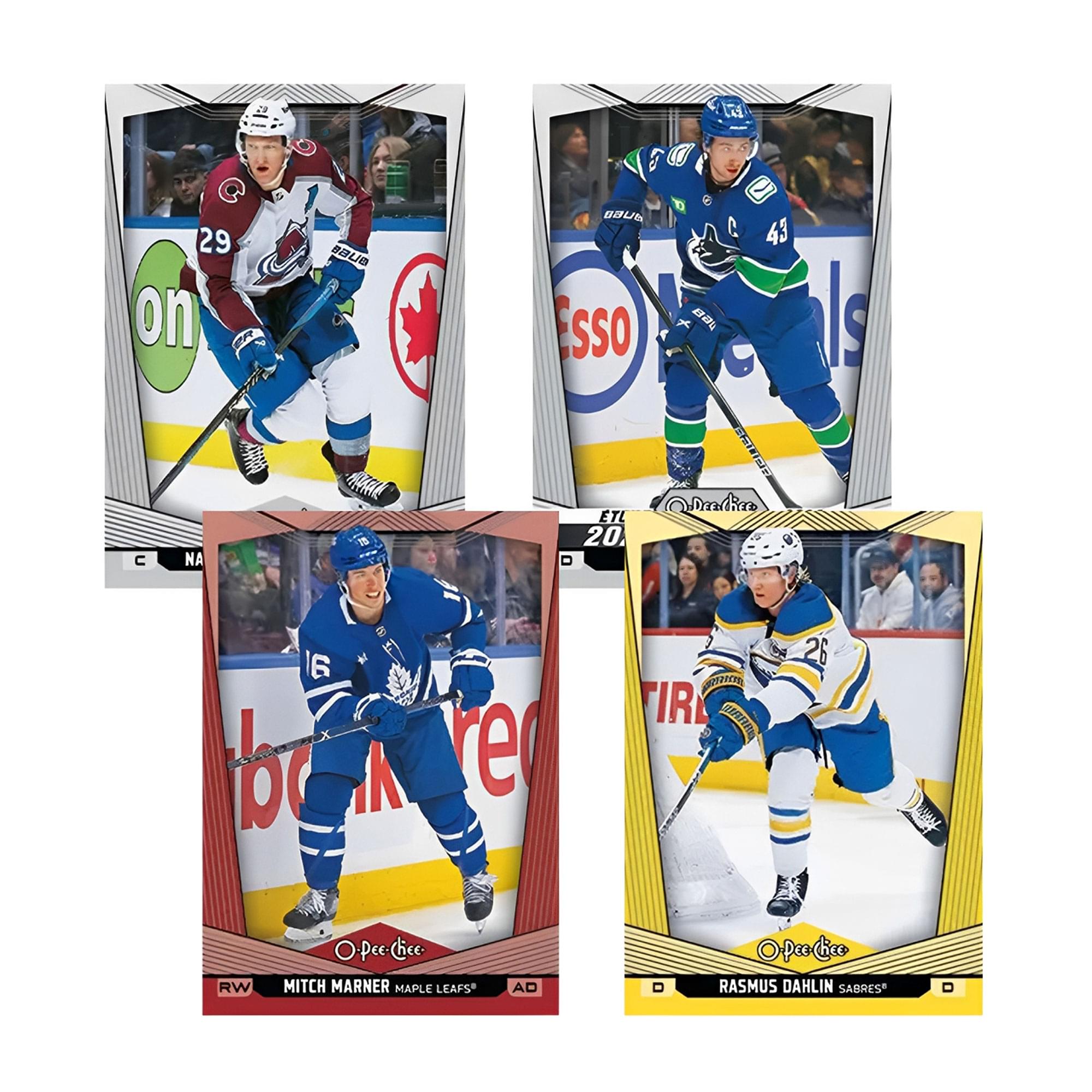 Sure, here is the corrected and grouped text from the image:

1. **Top Left Card:**
   - 29
   - C
   - NA
   - 15 ETL 20
   - Wndie lo I6 A re ASANTE TIR AEEA 26 RW O-Pee-Chee. Pee-Chee MITCH MARNER MAPLE LEAFS AO O-Pee-Chee peo Chice

2. **Top Right Card:**
   - 43
   - RW
   - RASMUS DAHLIN SABRES

3. **Bottom Left Card:**
   - 16
   - RW
   - MITCH MARNER MAPLE LEAFS

4. **Bottom Right Card:**
   - 26
   - D
   - RASMUS DAHLIN SABRES

5. **Logos and Text:**
   - on
   - Essso
   - bank
   - TIRE
   - O-Pee-Chee