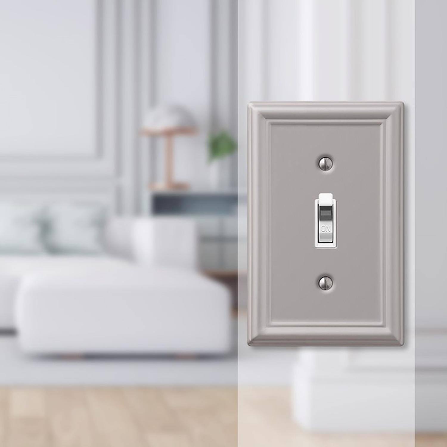 Left. AMERELLE - Amerelle Chelsea Brushed Nickel 1 gang Stamped Steel Toggle Wall Plate 1 pk - Nickel.