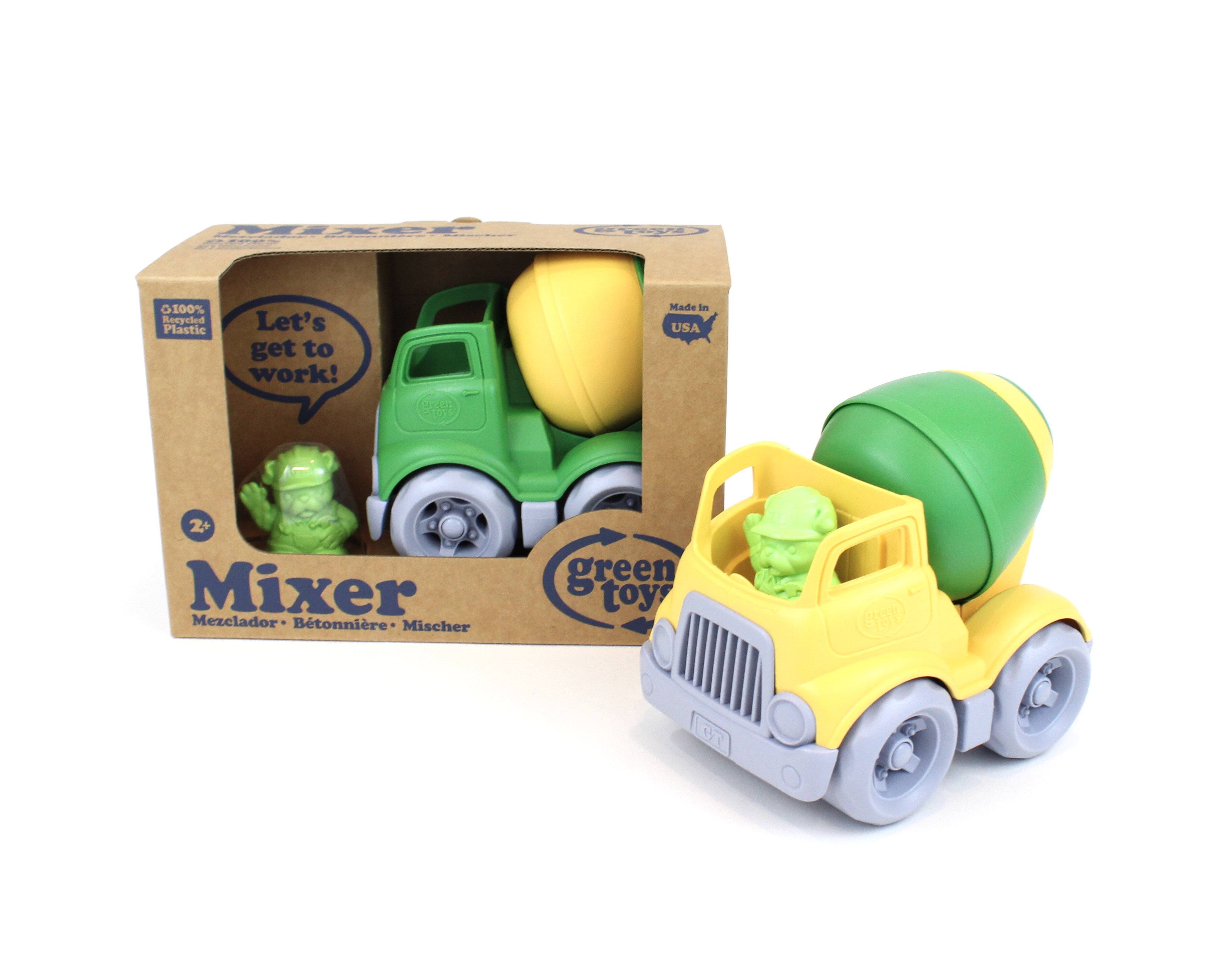 Sure, here is the corrected and grouped text from the image:

---

**Front of the Box:**

- "100% Plastic"
- "Let's get to work!"
- "Made in USA"
- "Mixer"
- "Mezclador • Betonnière • Mischere"
- "green toys"
- "2+"

**On the Toy:**

- "green toys"

---

This text is grouped based on its location and context on the packaging and the toy itself.