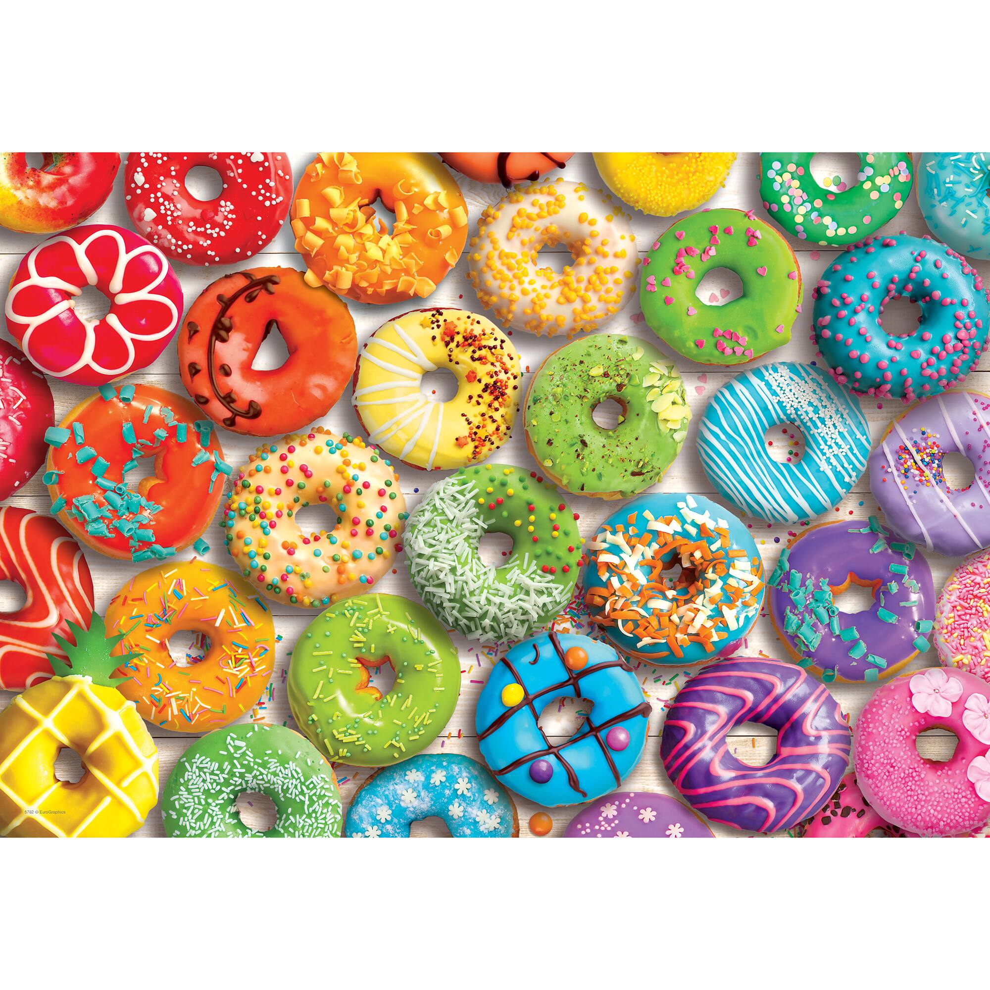 Left. Eurographics - Puzzle Tin: Donut Rainbow - 550 Piece Jigsaw.