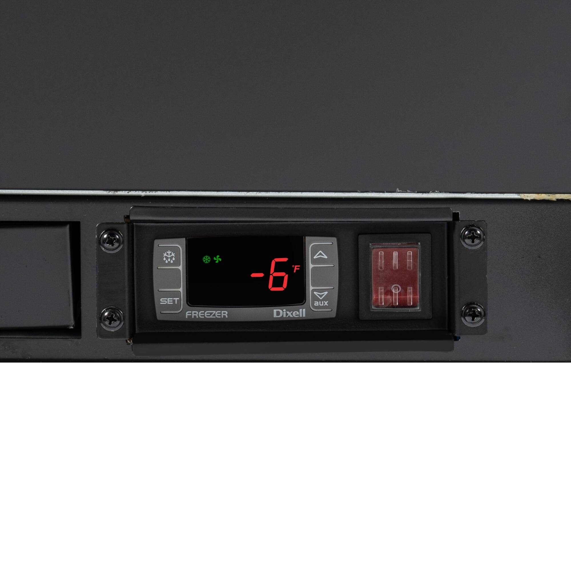 The text on the image reads "F - -6 SET aux FREEZER Dixell." This text is likely related to a temperature setting or a control panel for a freezer or refrigerator. The "F" could represent the freezer temperature, and the "-6" indicates that the temperature is set at 6 degrees below zero. The "SET aux" might refer to an auxiliary temperature setting, and "Dixell" could be a brand or model name of the appliance.