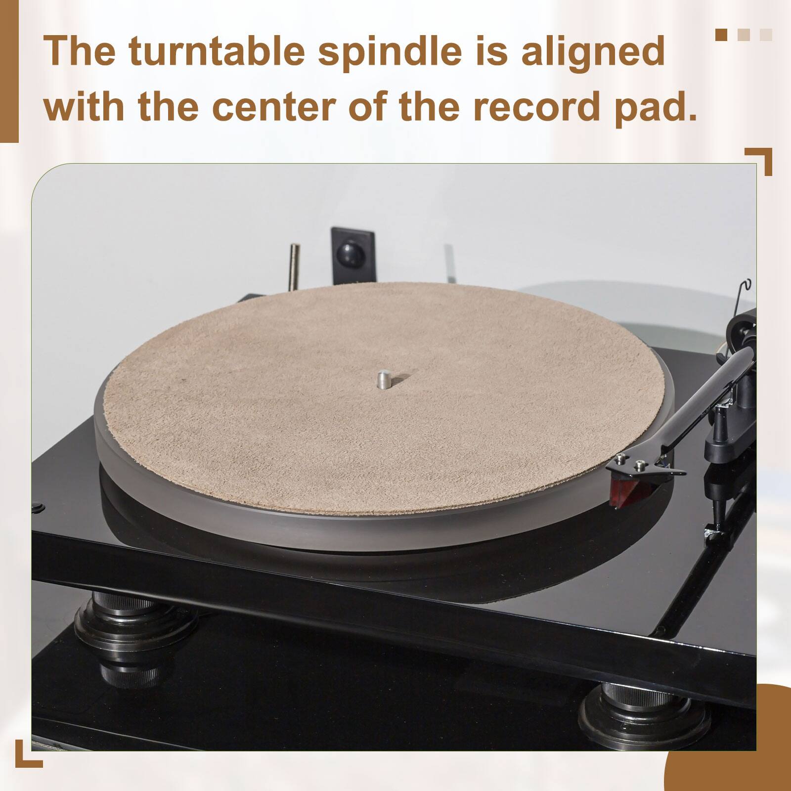 The turntable spindle is aligned with the center of the record pad.