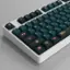 Left. HYTE - HYTE - Official Songque "Shadowdimmer" Keycap Set and Encased Fortune Desk Pad Bundle - Green.