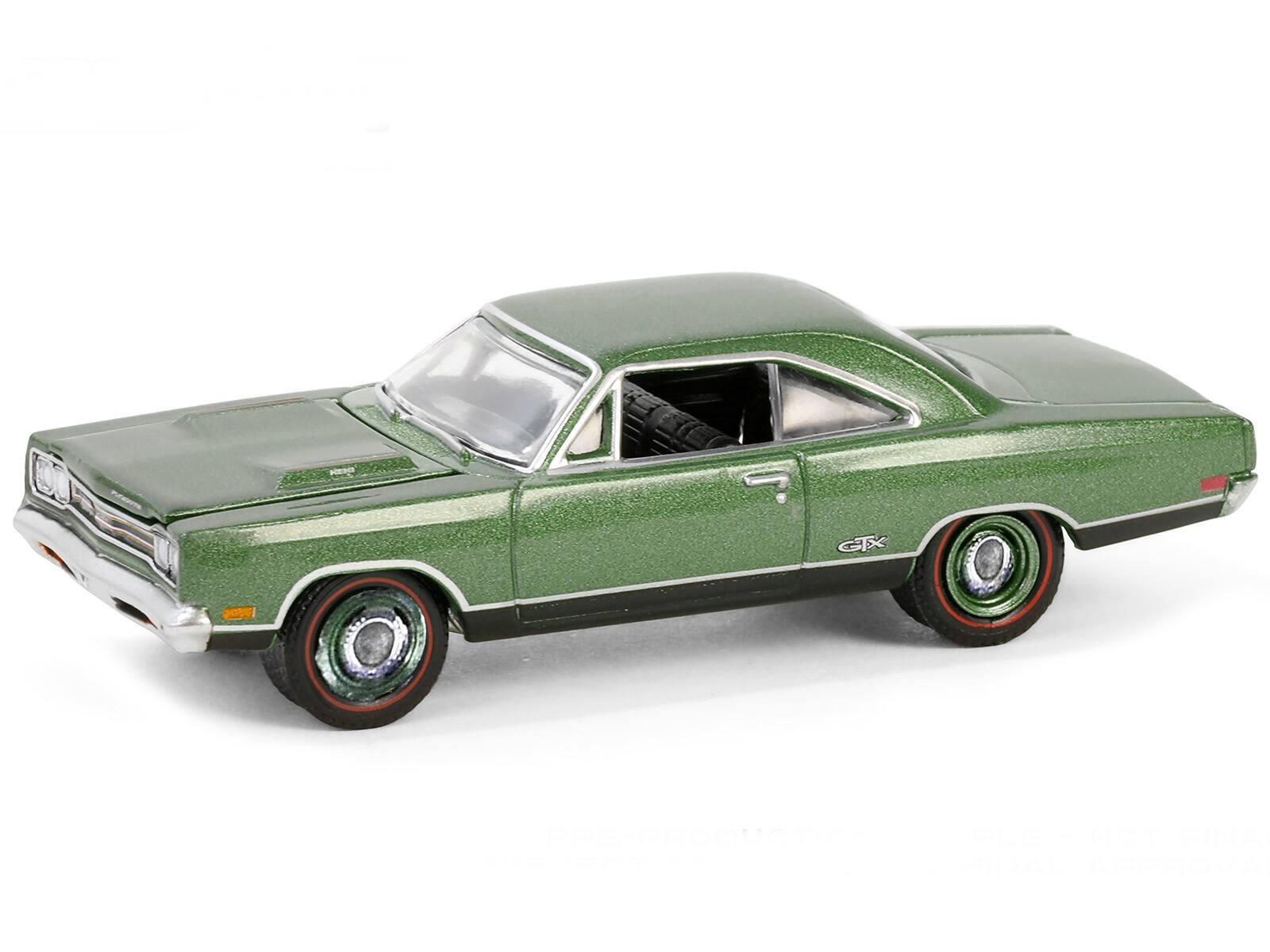 Angle. Greenlight - 1969 Plymouth HEMI GTX F8 Ivy Green Metallic Palm Beach 2023 Barrett Jackson Scottsdale Edition Series 14 1/64 - Green Metallic.