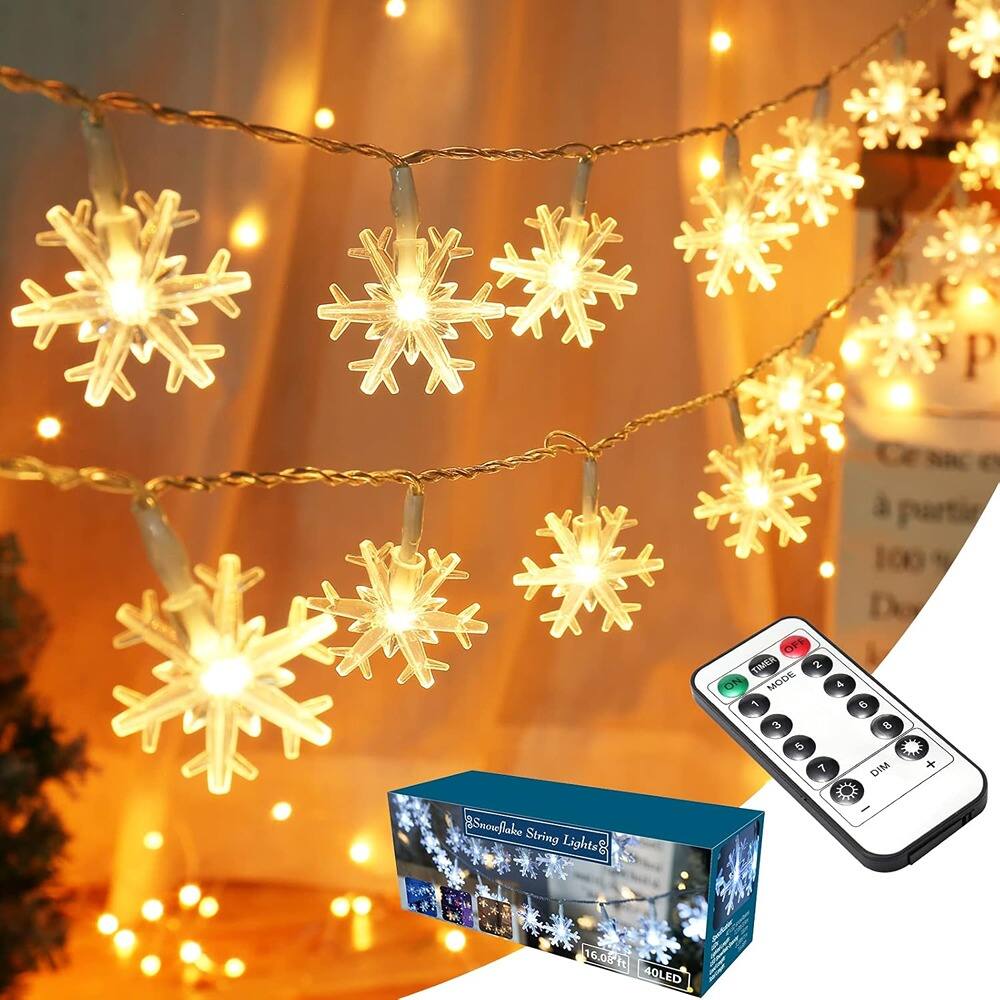 Sure, here is the corrected and grouped text from the image:
---
**Snowflake String Lights**
- **16.05 ft**
- **40 LED**
**Remote Control:**
- **Power**
- **Mode**
- 1
- 2
- 3
- 4
- 5
- 6
- 7
- 8
- **Dim**
- **+**
- **-**
---
This text is organized based on the information visible in the image.