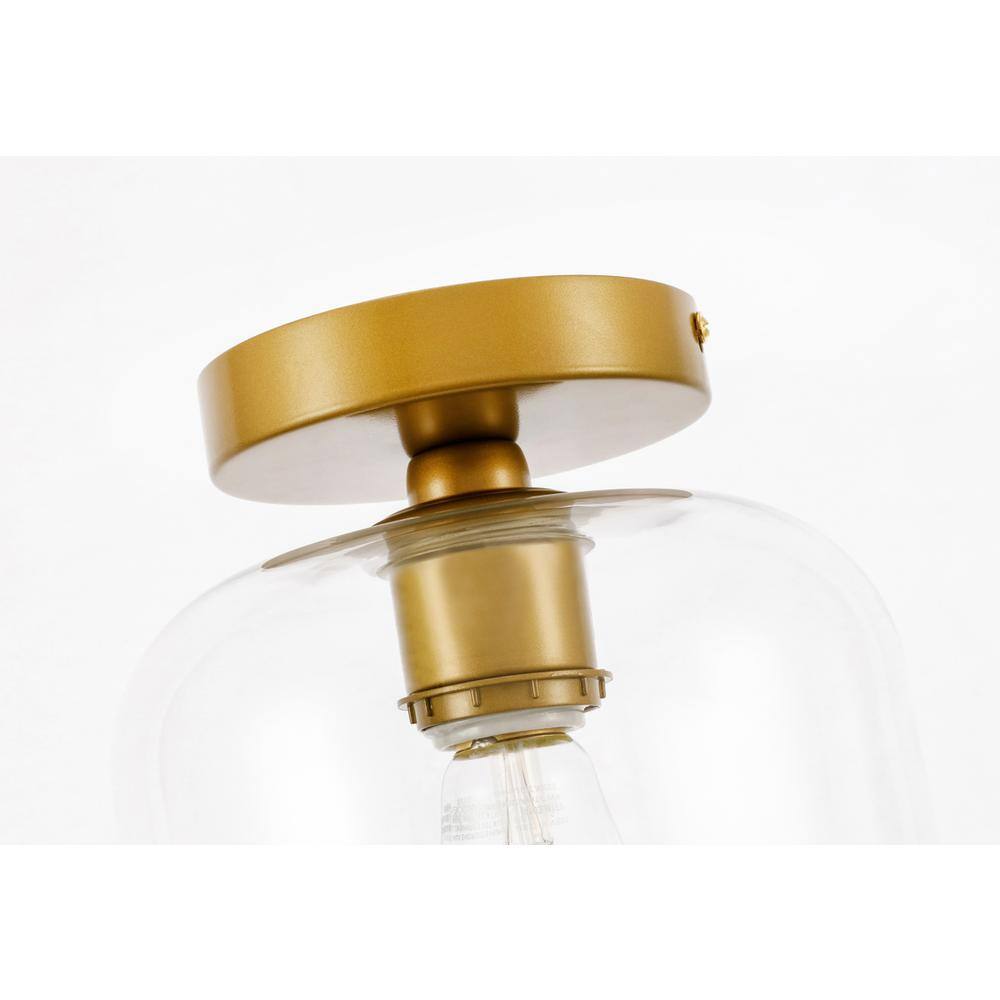 Left. Living District - Collier 1 light Brass and Clear glass Flush mount - Brass And Clear Glass.