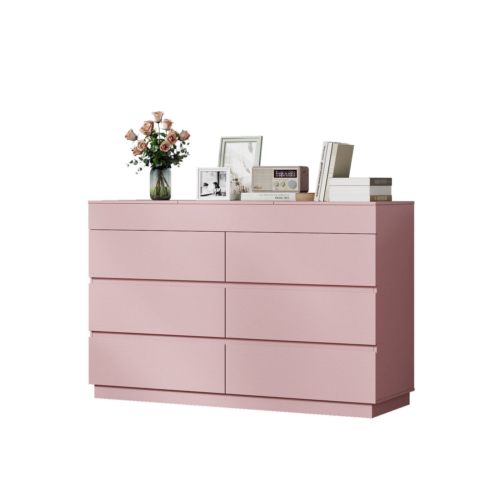 A pink dresser with six drawers.