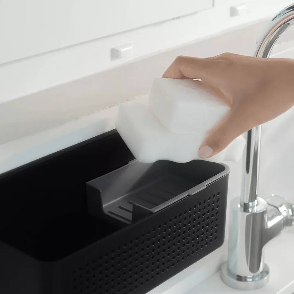 Left. OU - Hanging Sink Organizer, Self‑Adhesive Caddy with Removable Sponge Tray for Kitchen Storage - Black.