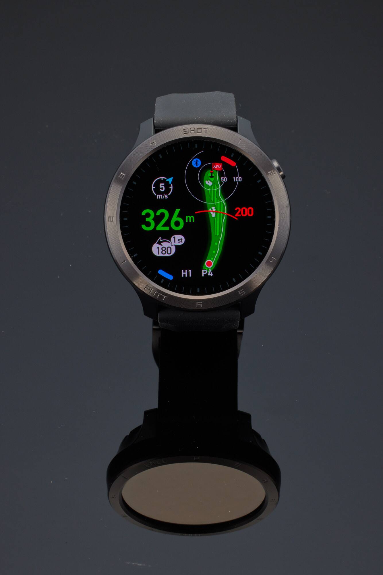 The text on the image reads: "5  SHOT 1 m - APL I 50 5 m/s 326 m 1 st 180 H1 P4 PUTT 6 100 200 5 n L - TTUE P 71". This text appears to be a combination of various golfing terms and measurements.

To group and correct the text, we can break it down into different sections:

1. "5  SHOT 1 m" - This could be a golf shot distance measurement, with "5" representing the number of shots, "1 m" representing the distance in meters.

2. "- APL I 50 5 m/s" - This could be a reference to the wind speed and direction, with "APL" possibly standing for "Average Putt Length" or "Air Pressure Loss." The "50" could be the wind speed in mph, and "5 m/s" could be the wind direction.

3. "326 m 1 st 180 H1 P4 PUTT" - This could be a golf course measurement, with "326 m" representing the distance from the tee box to the hole, "1 st" representing the number of strokes needed to reach the hole, and "180 H1 P4 PUTT" possibly representing the hole number and the type of putt required.

4. "6 100 200 5 n L" - This could be a golf score measurement, with "6" representing the number of strokes, "100" representing the number of strokes under par, "200" representing the number of strokes over par, and "5 n L" possibly representing the number of strokes needed to reach the next level of performance.

5. "- TTUE P 71" - This could be a reference to the golf course's par, with "TTUE" possibly standing for "Total To Par" and "P" representing the par number. The "71" could be the current score of the golfer.

By grouping and correcting the text, we can better understand the various golfing terms and measurements present in the image.