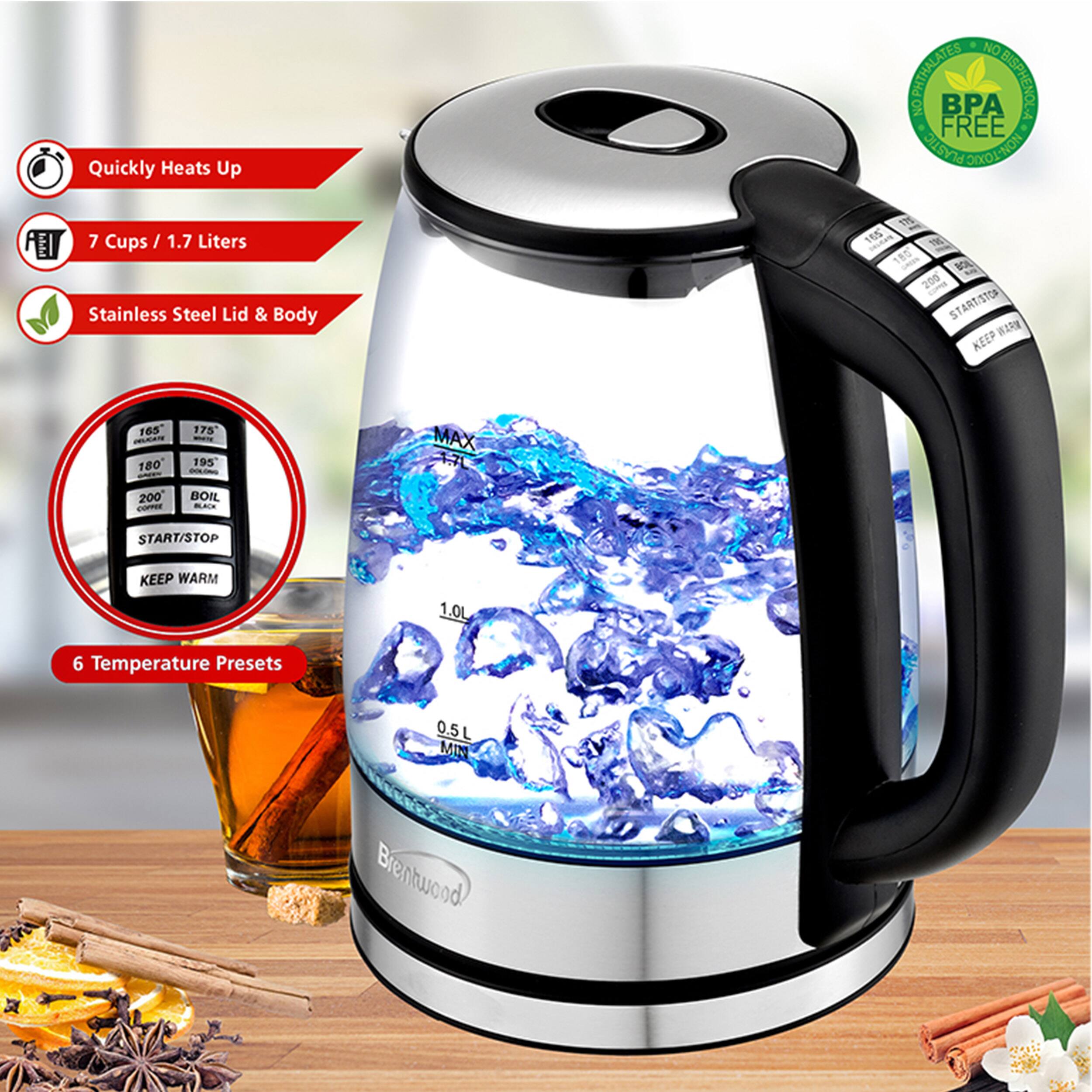 The image features a Brentwood water kettle with a stainless steel lid and body. It is designed to heat up quickly and is non-toxic, as it does not contain BPA. The kettle has a capacity of 7 cups or 1.7 liters and comes with a 1.0L, 0.5L, and 1.55L water tank. The kettle also has a 6-temperature preset function and a start/stop button for added convenience. The image shows the kettle sitting on a wooden table, and there is a cup nearby.