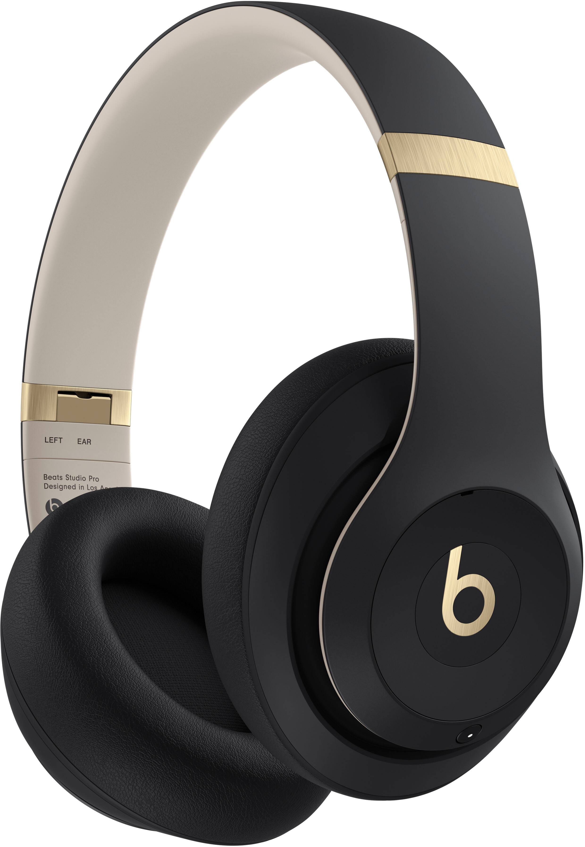 The image shows a pair of Beats Studio Pro headphones. The headphones are black and gold in color, with a gold stripe on the earpiece. The headphones are designed in Los Angeles and are known for their high-quality sound and comfortable fit. They are an excellent choice for anyone looking for a premium listening experience.
