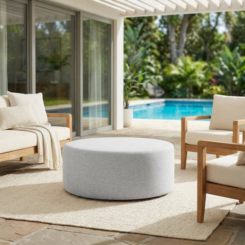Left. Outdoor Escape - Woven Heathered Fabric Outdoor Ottoman In Neutral Tone For Patio Comfort - Gray.