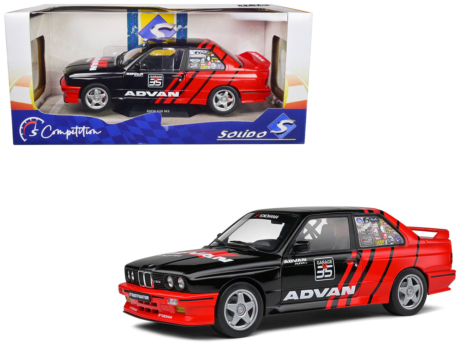 Sure, here is the corrected and grouped text from the image:

**Box:**
- ADVAN
- BMW E30 M3
- GARAGE 35
- Competition
- SOLIDO
- S

**Car:**
- ADVAN
- GARAGE 35
- STREET FIGHTER
- TOYO TIRES
- (Various other small decals and logos)