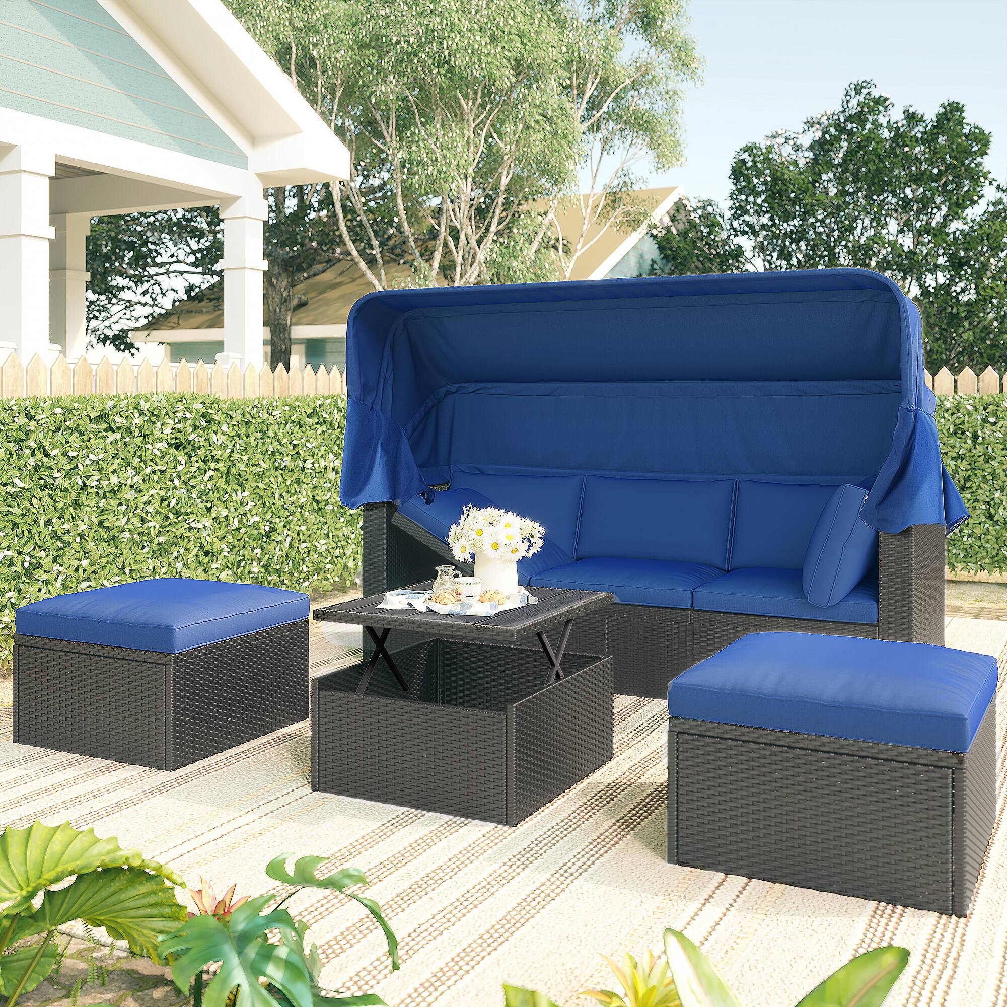 Left. Siljoy - Rattan Daybed with Retractable Canopy, Outdoor Sectional Sofa with Washable Cushions - Blue.